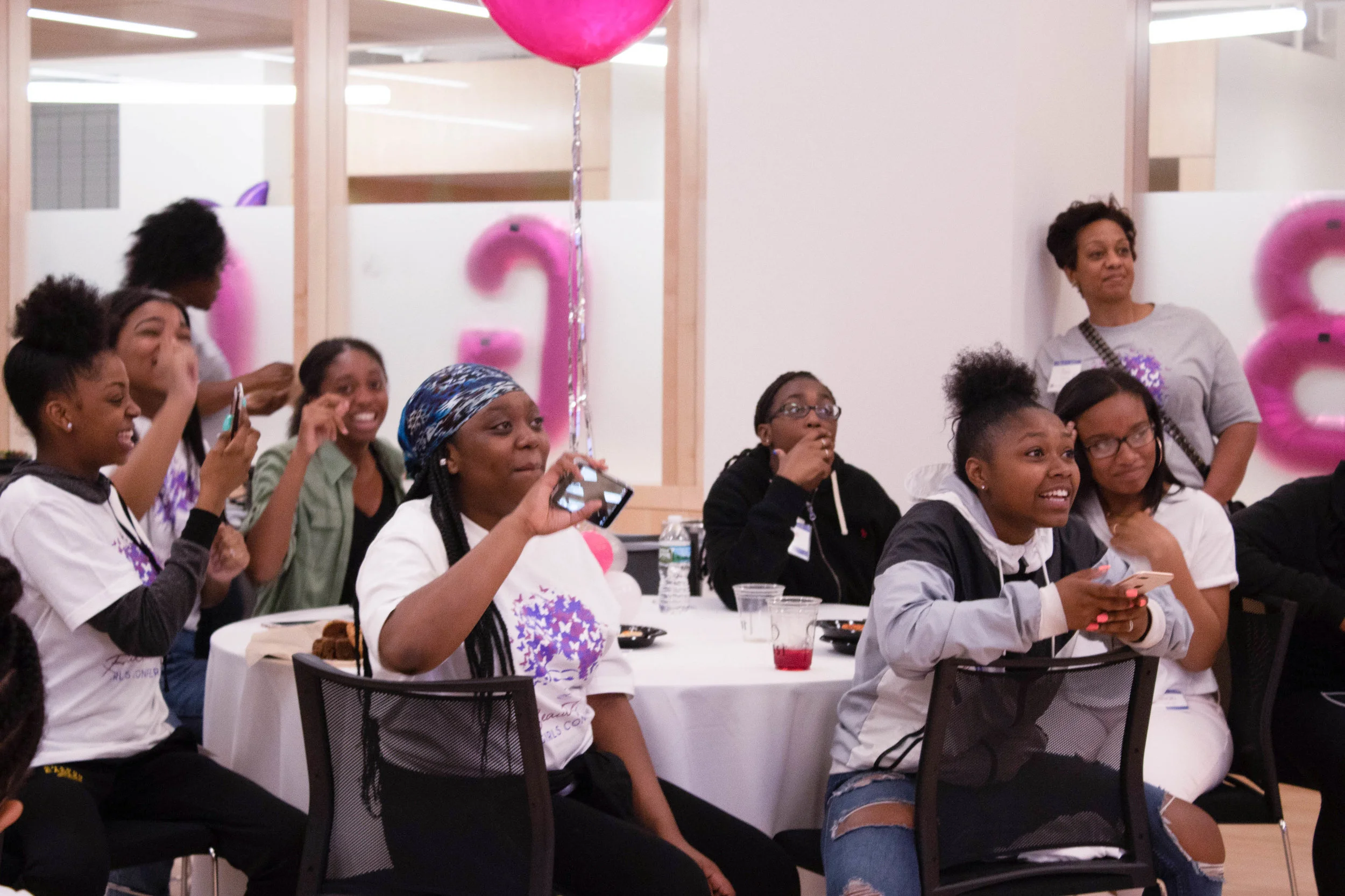 Cheering & looks of amazement as the ladies cheered on their fellow peer, rapper J-Simone.