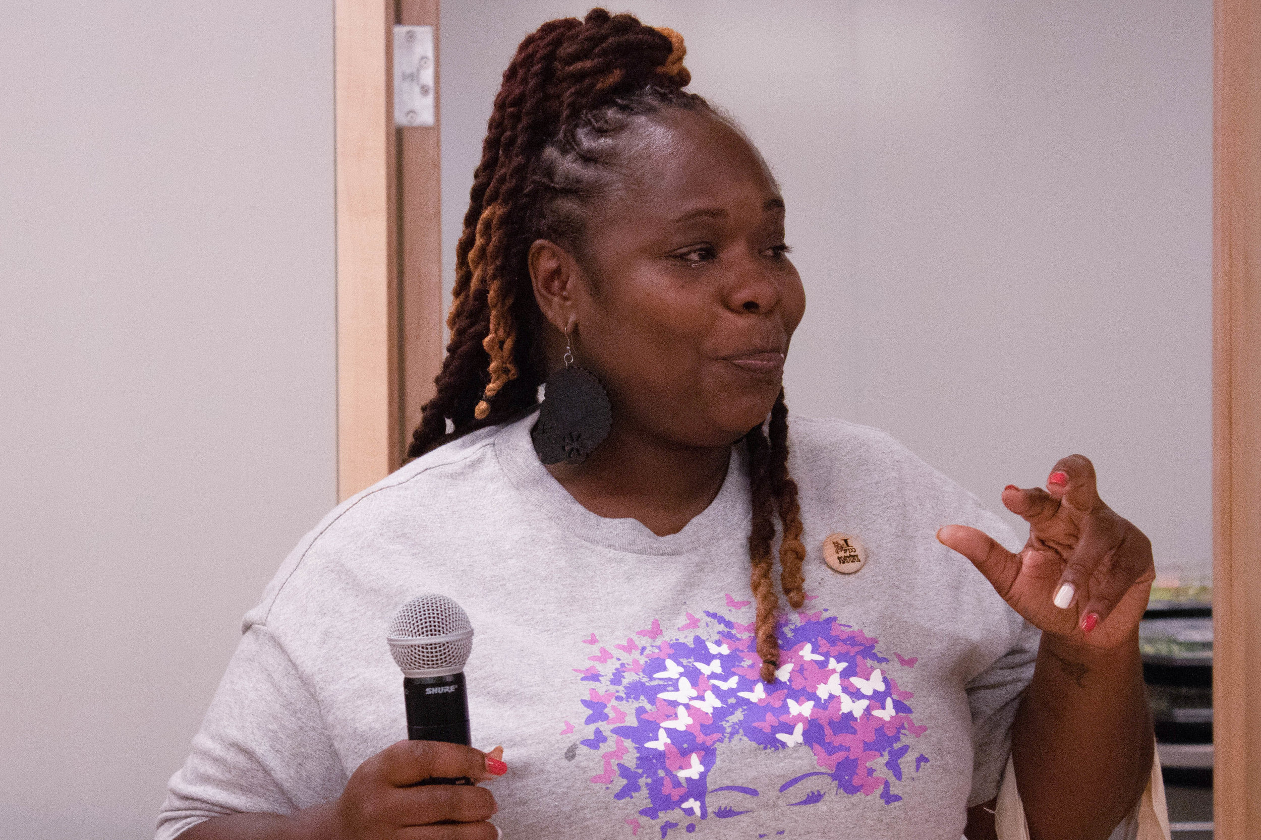 Conference organizer Shana Bryant has an emotional moment when addressing the room at the end of the conference.