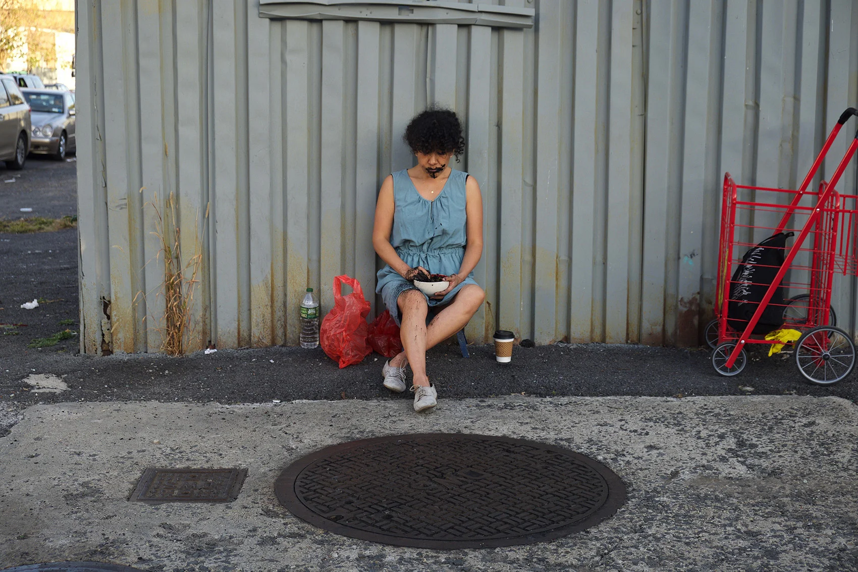 Monica Palma, Chacmool3, Burnt tortillas, coffee, saliva, dress and manhole cover, 2017