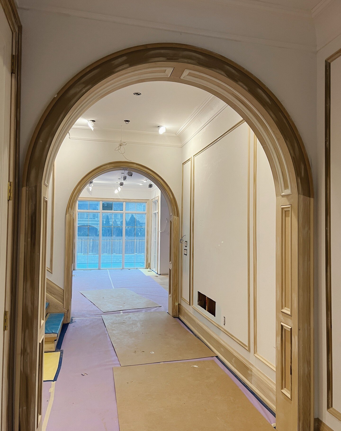 Take a look at the trim work in a recent home. We have curved recessed archways and tall applied mouldings throughout the main floor and staircase. 

#TrimWork #HomeDesign #InteriorDecor