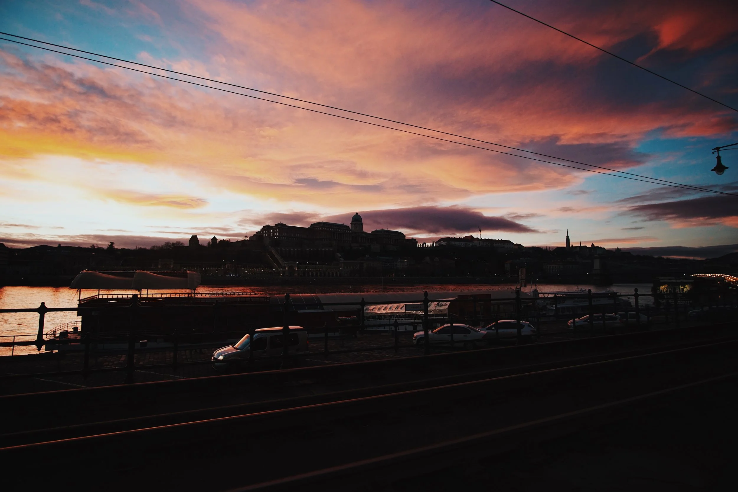 Buda castle glowing during the sunset the previous day