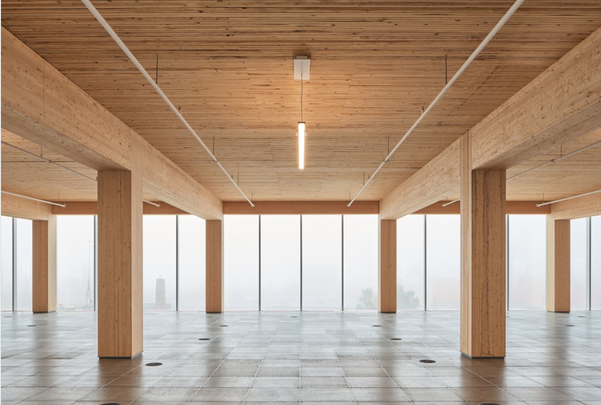 Naturally lit interior office space showing timber frame construction