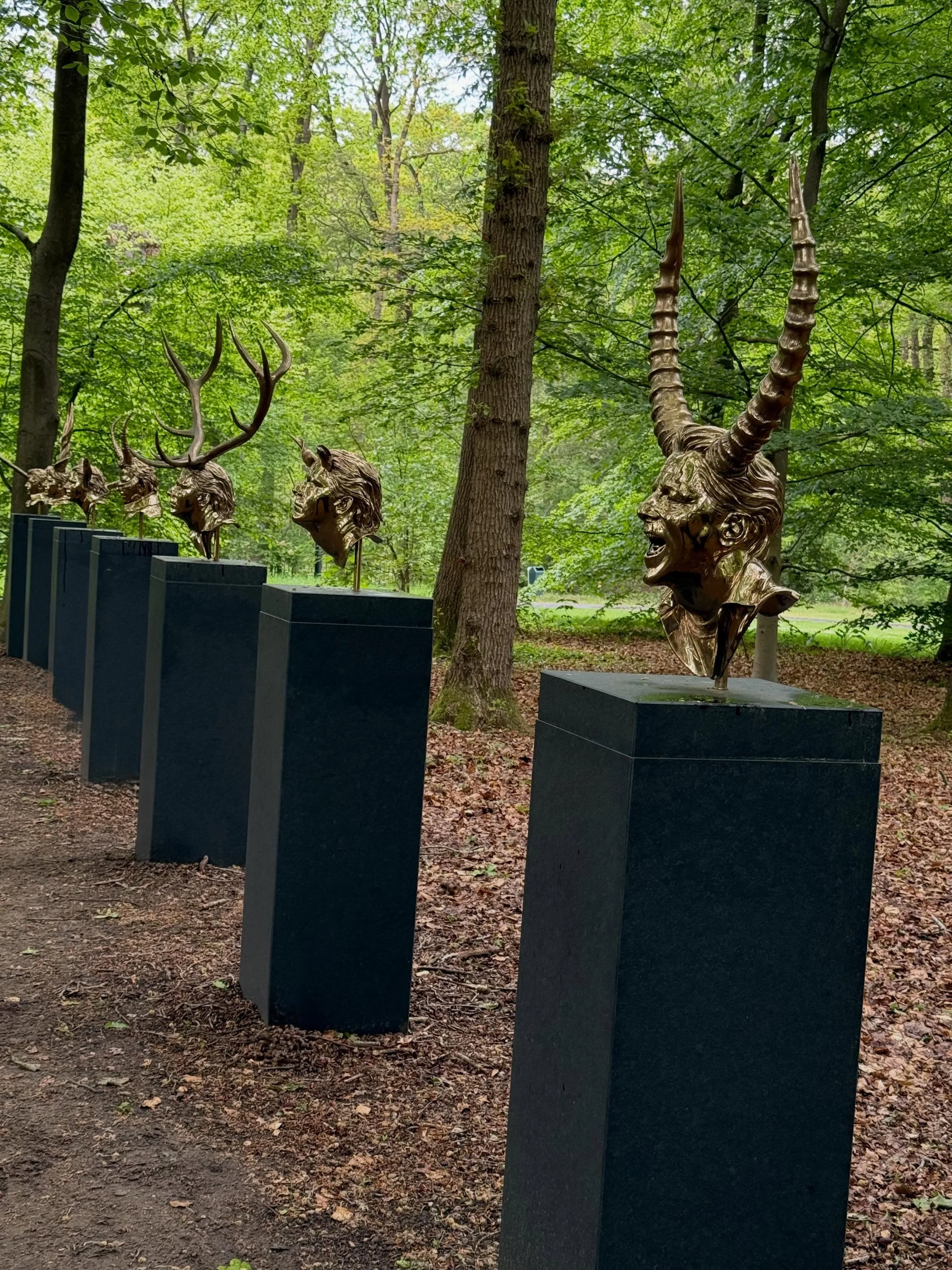 Intriguing art in the beautiful sculpture garden in the Hoge Veluwe National Park in Netherlands, previously the home of the Kroller-Mullers. The sculptures are by @janfabreteachinggroup Jan Fabre, Chapters 2010, and Jean Dubuffet, Jardin d&rsquo;&ea