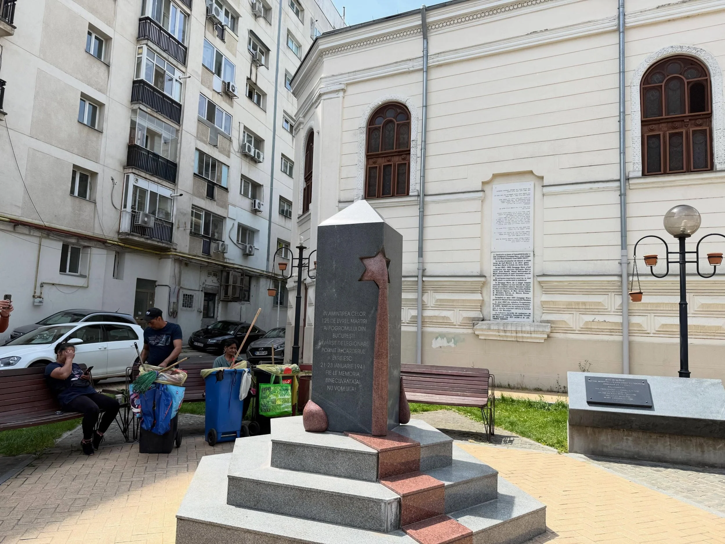 A memorial to those killed here, in Bucharest,  Romania,  in a pogram during the early part of World War II. The square also contains remnants of a synagogue, and a place of respite for the workers today. The Choral Synagogue is in use today with a s
