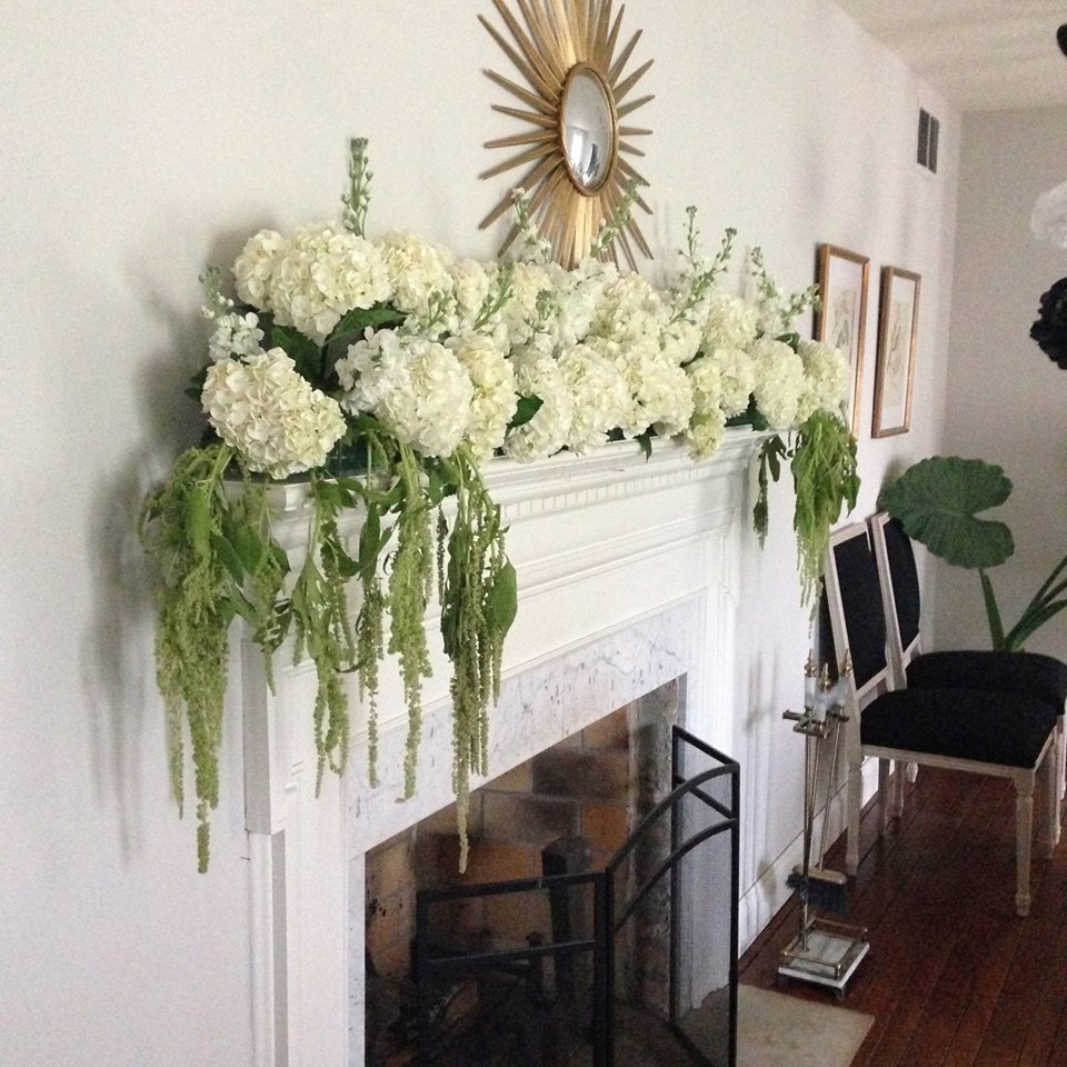 The mantle, dripping in green amaranth, hydrangeas and stock