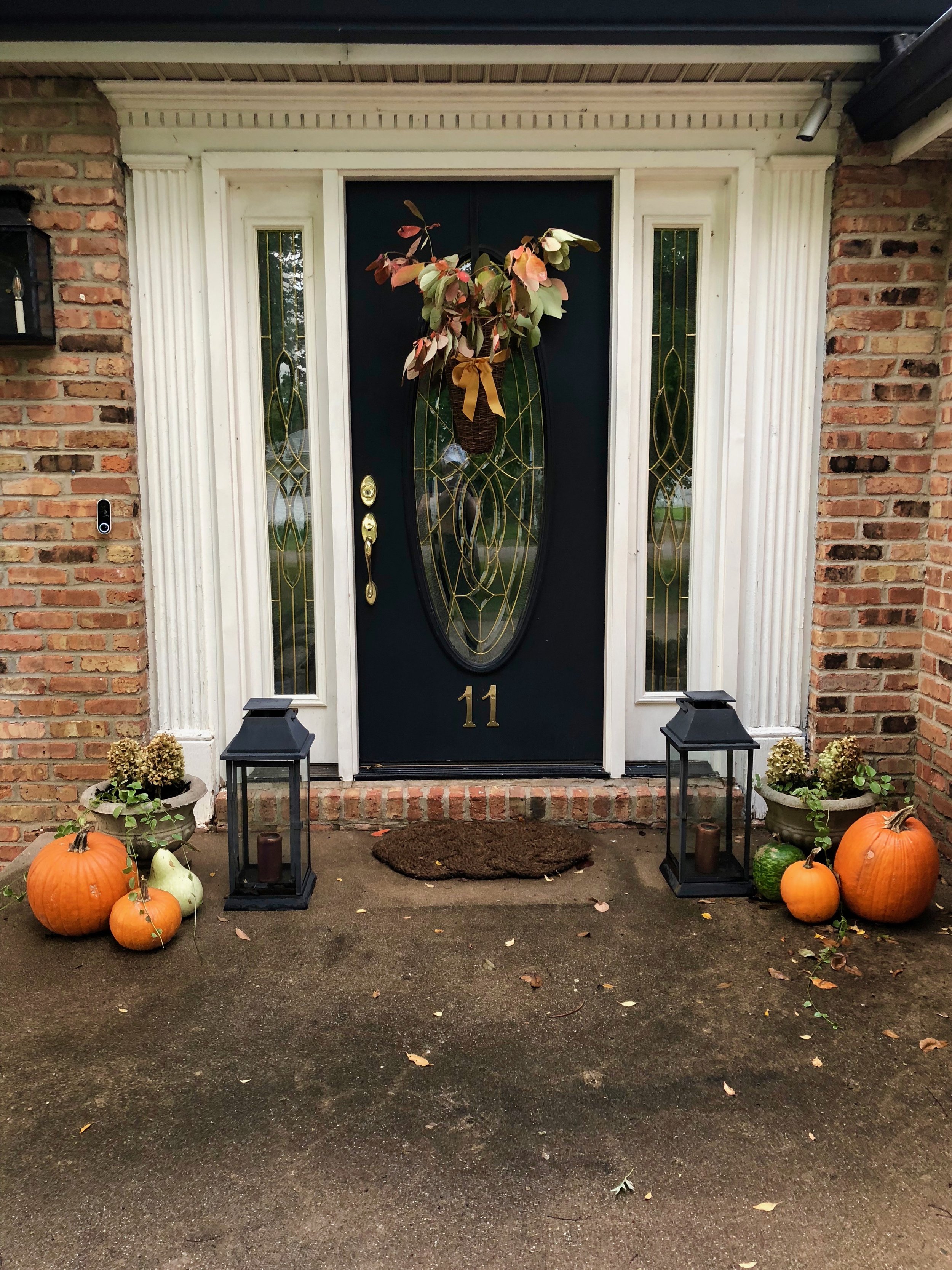 Pumpkins and gourds flank our entrance