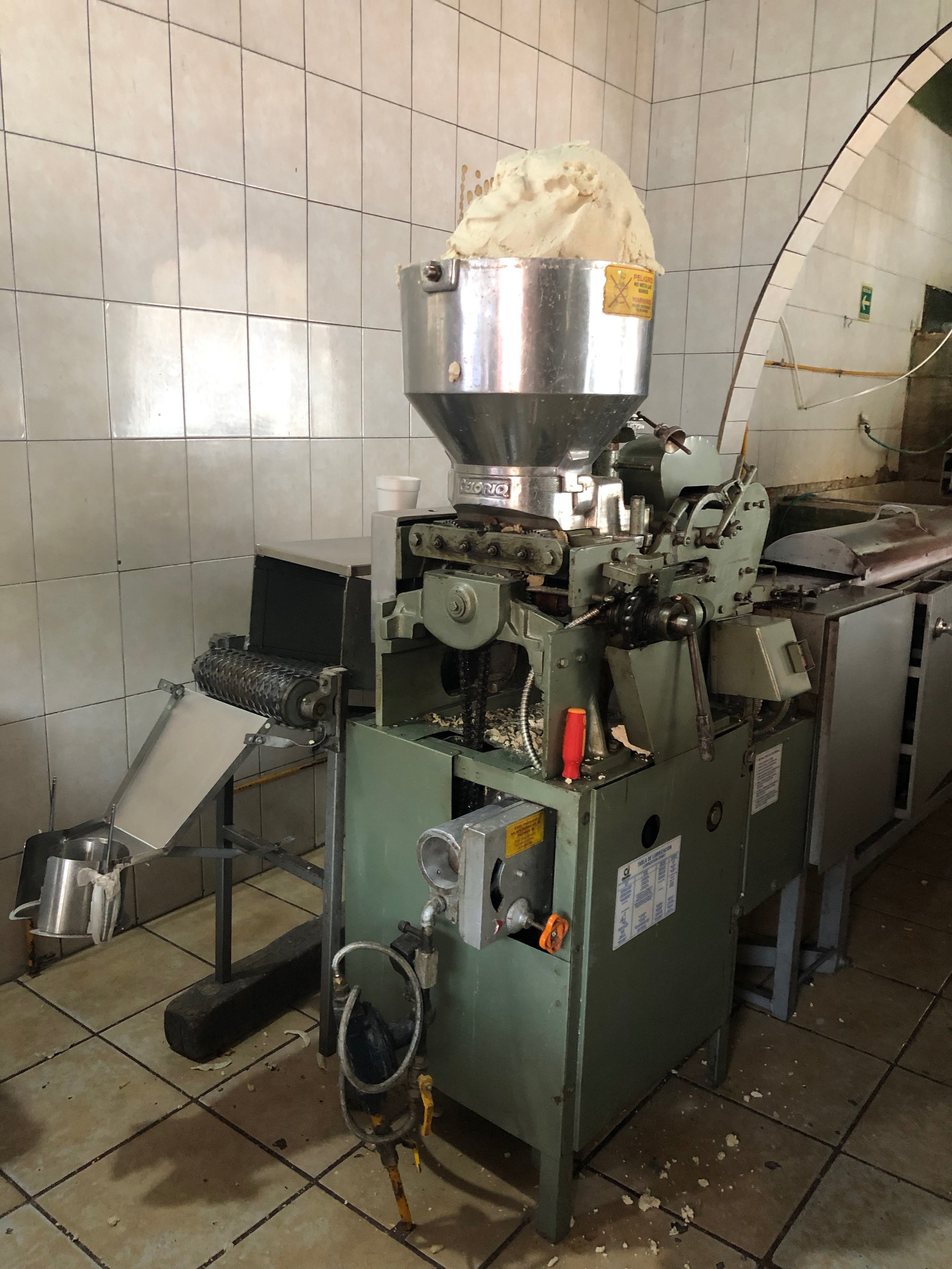 This machine processes the masa and makes tortillas