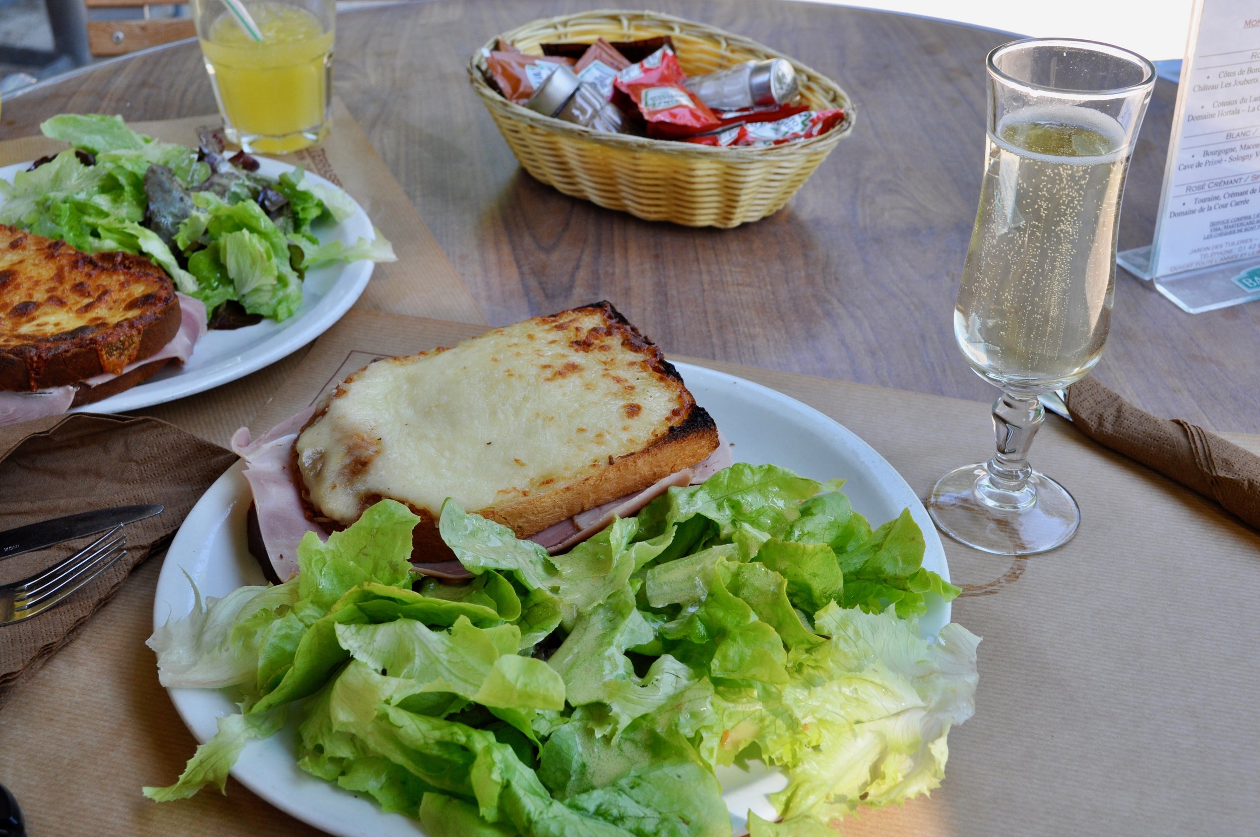 Croque monsieur and Crémant enjoyed in the Tuileries Gardens, outside the Louvre