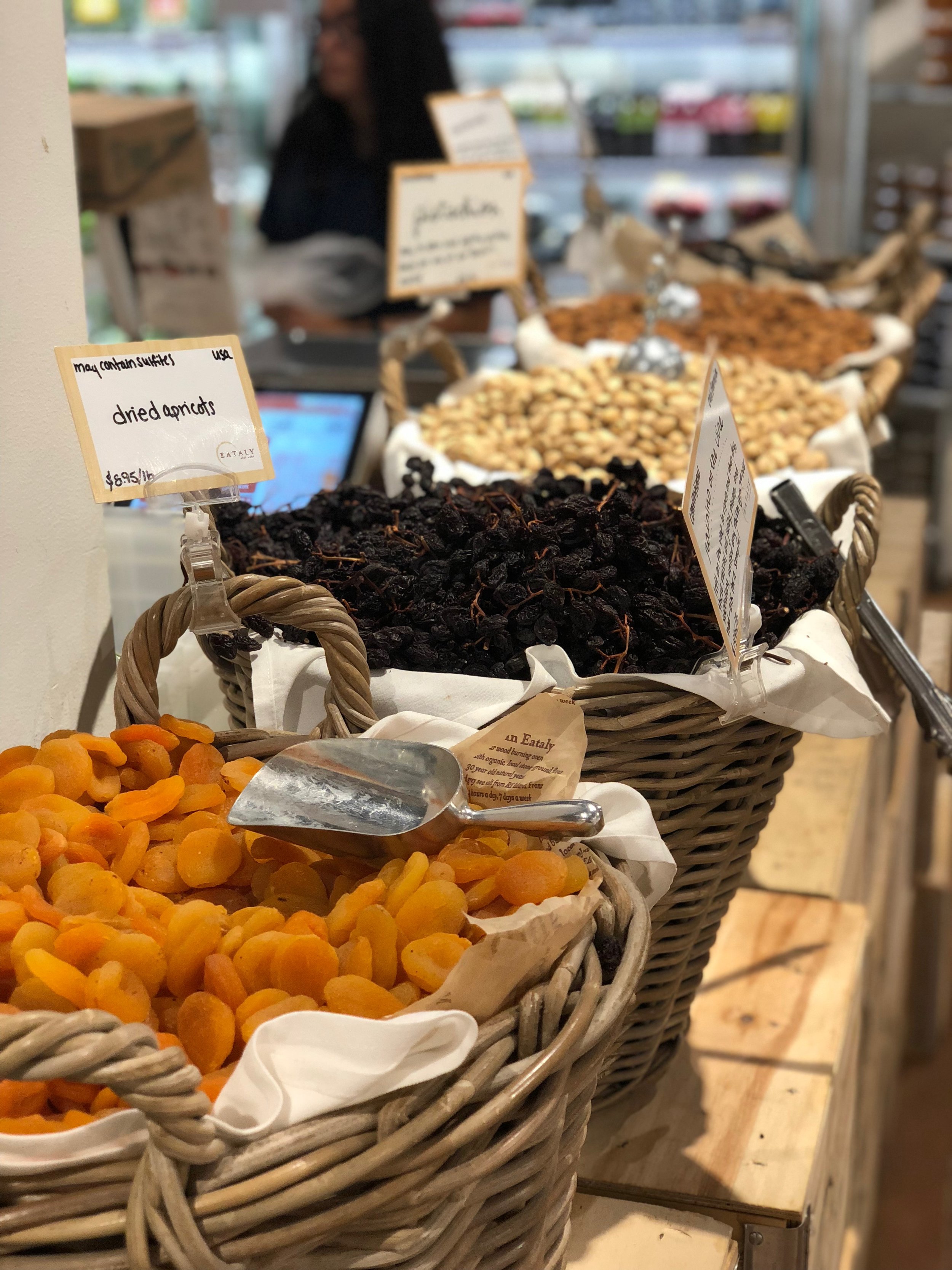Open market-style presentation of dried fruits and nuts