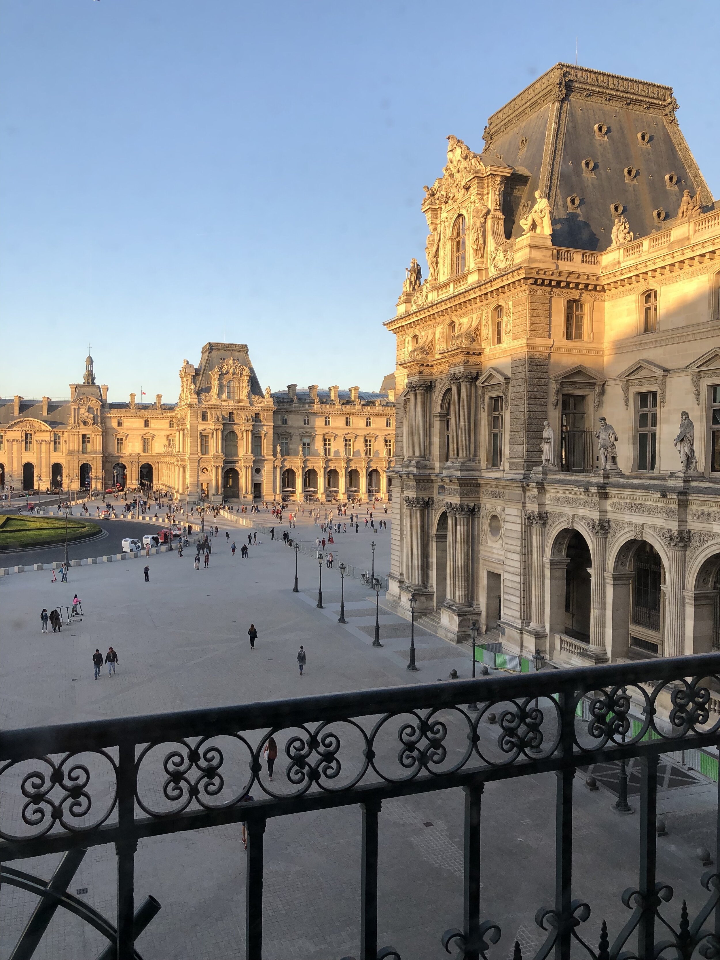 The sun setting on the Louvre