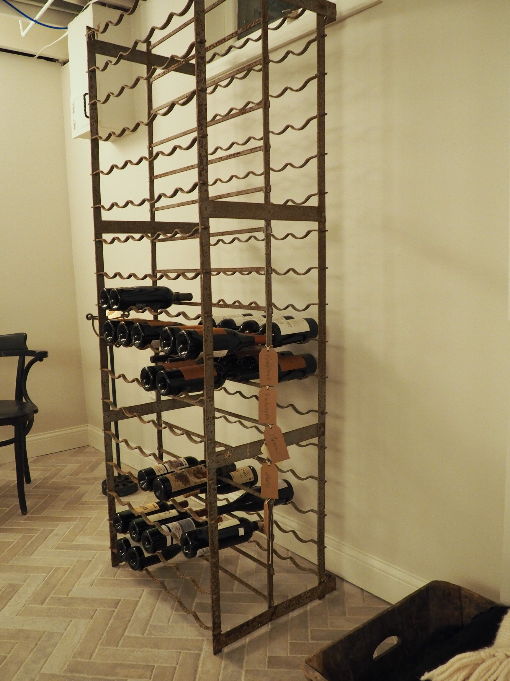 This is a 1920s vintage wine rack from France.
