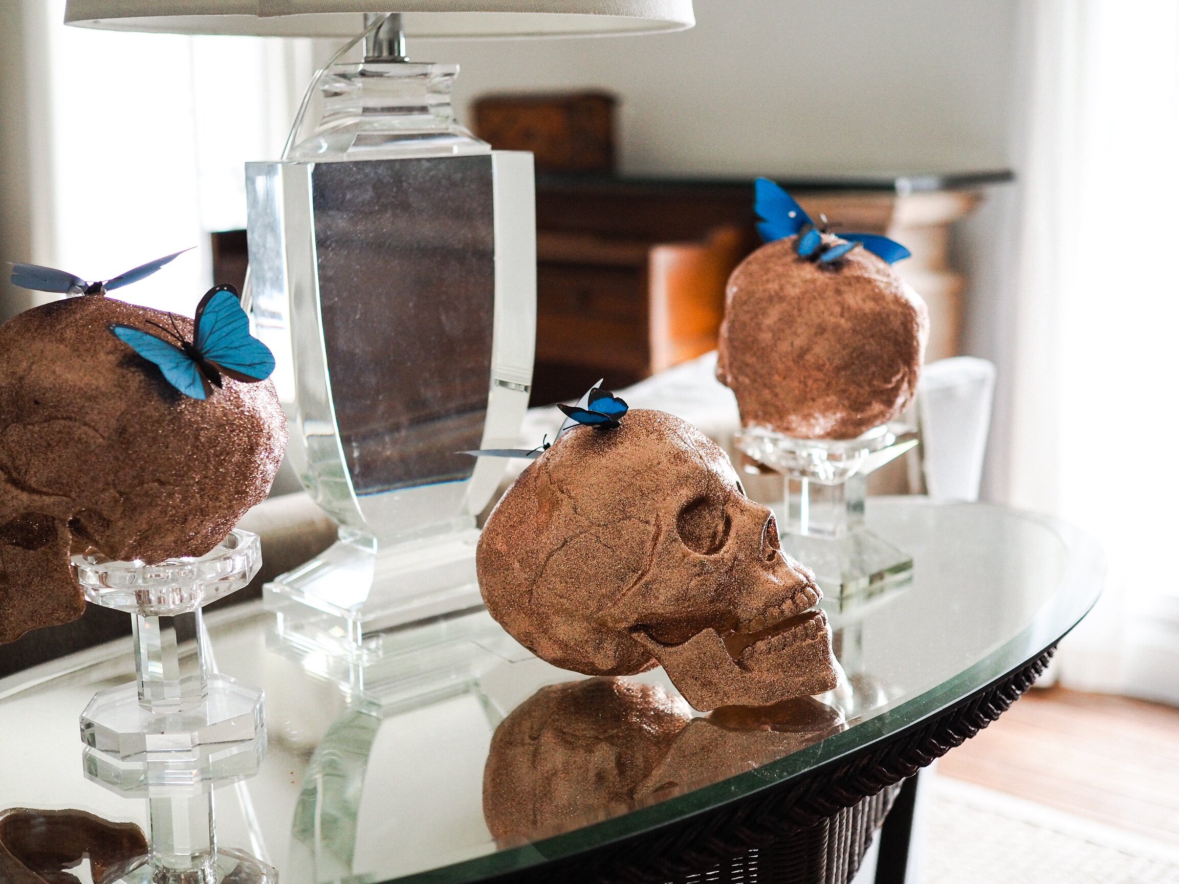 Glittery copper skulls sparkle in the sitting room