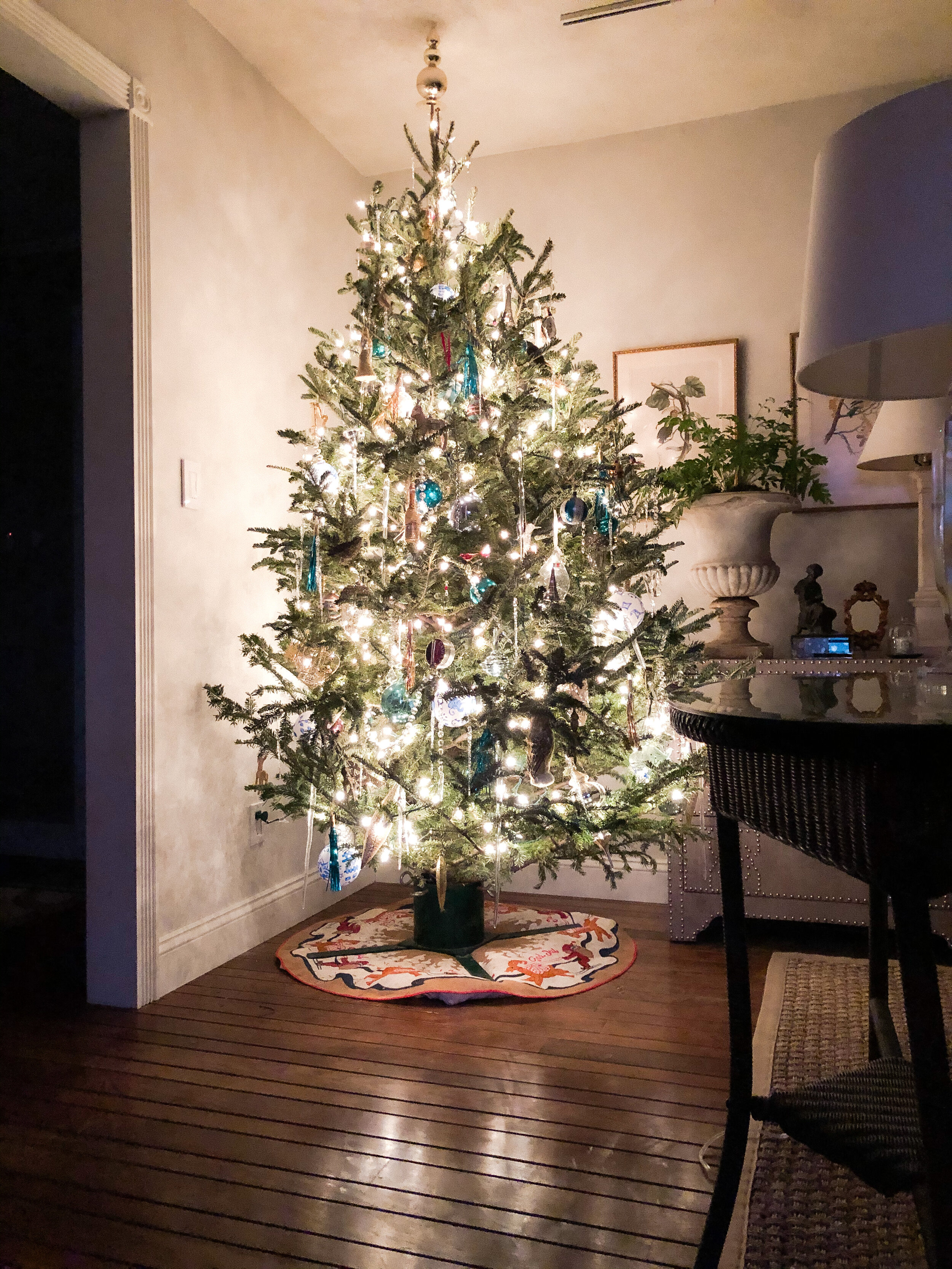 Our pretty tree with a mix of vintage and new baubles sits atop a sentimental ‘God Jul’ Scandinavian tree skirt