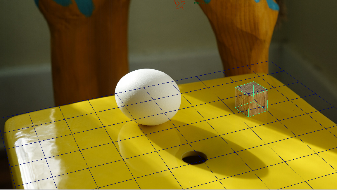 Cube in alignment with photo