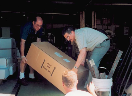 Sal Baglieri, Ed Kulahli and Ziggy Przybylo load Power Hawk rescue equipment destined for Ground Zero