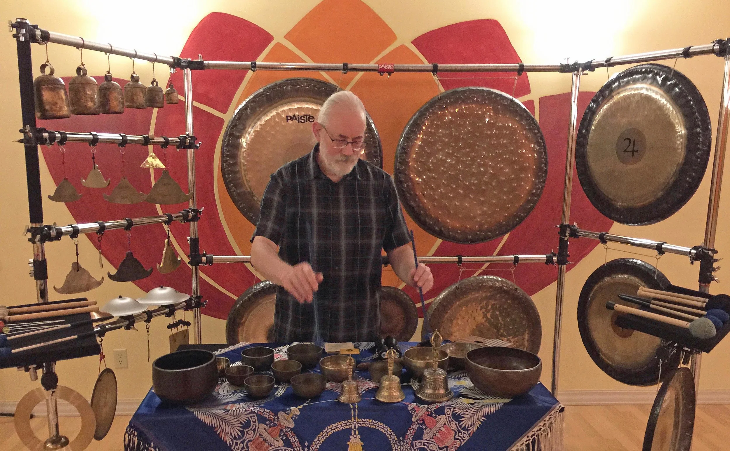 Michael uses a large collection of resonating metal instruments that he has collected over the past 40+ years.