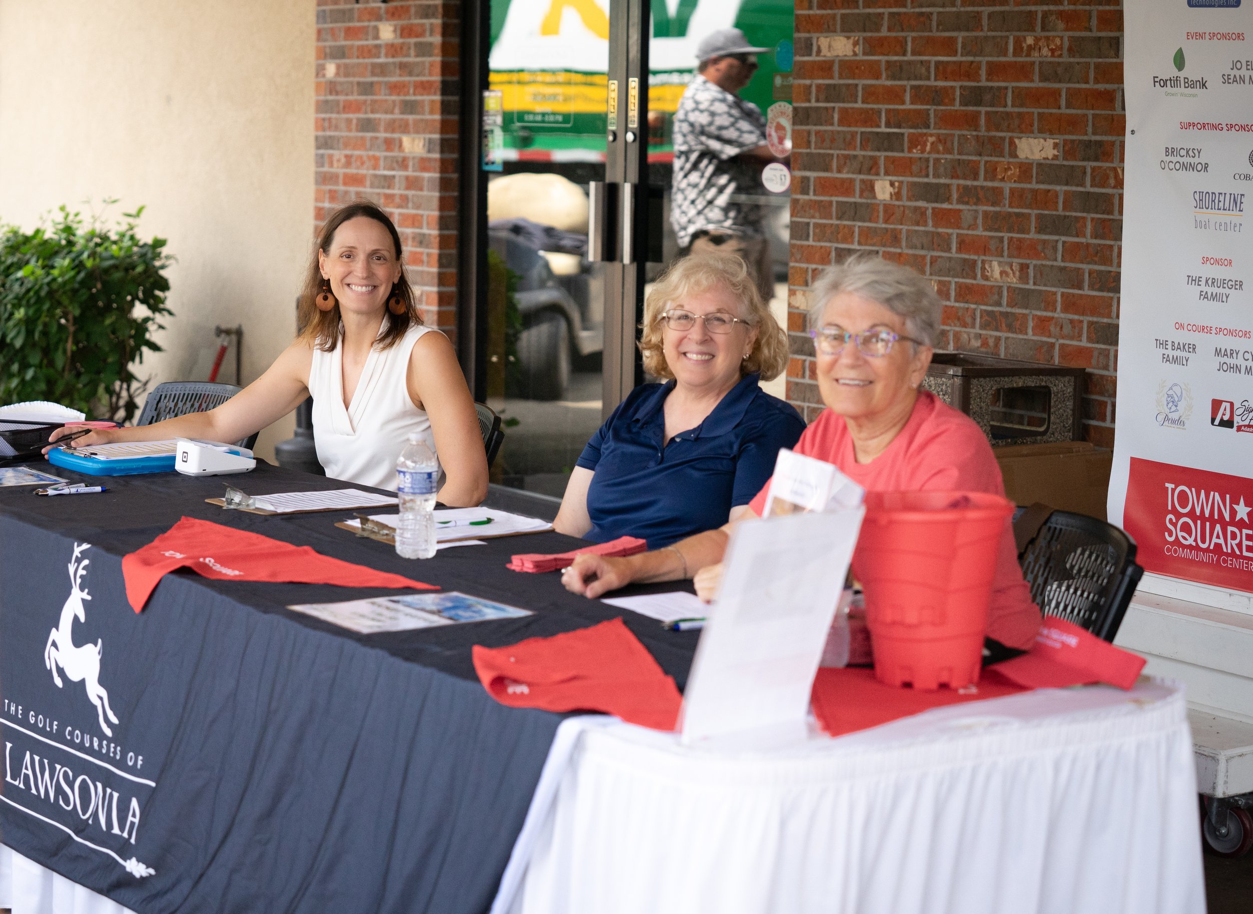 Tee Up Volunteer Sign-Up Table.jpg