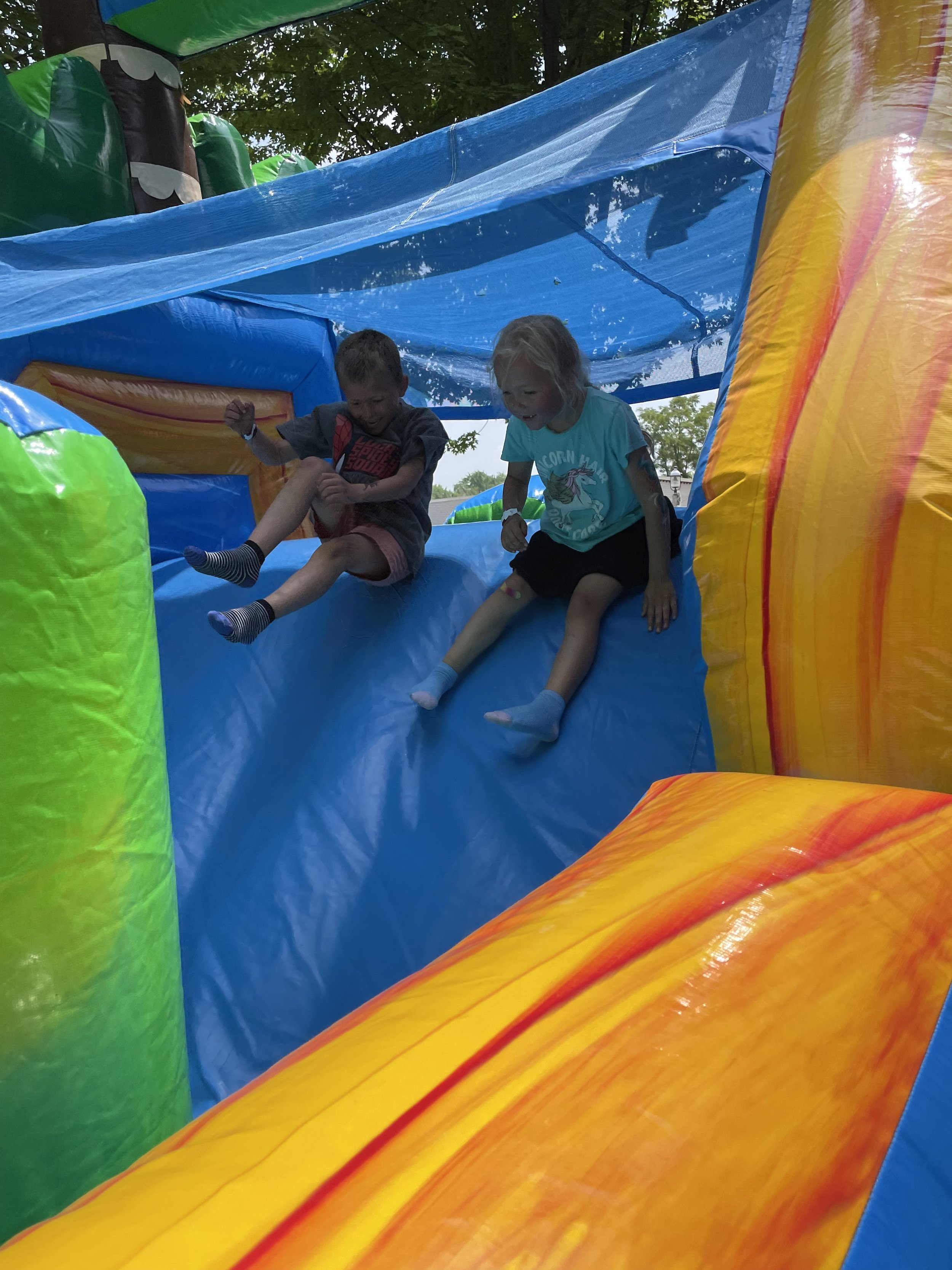 children playing on inflatable.jpeg