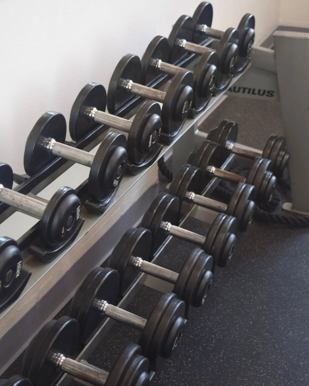 Rack of dumbbells and free weights in the Green Lake Fitness weight room in Green Lake, Wisconsin.