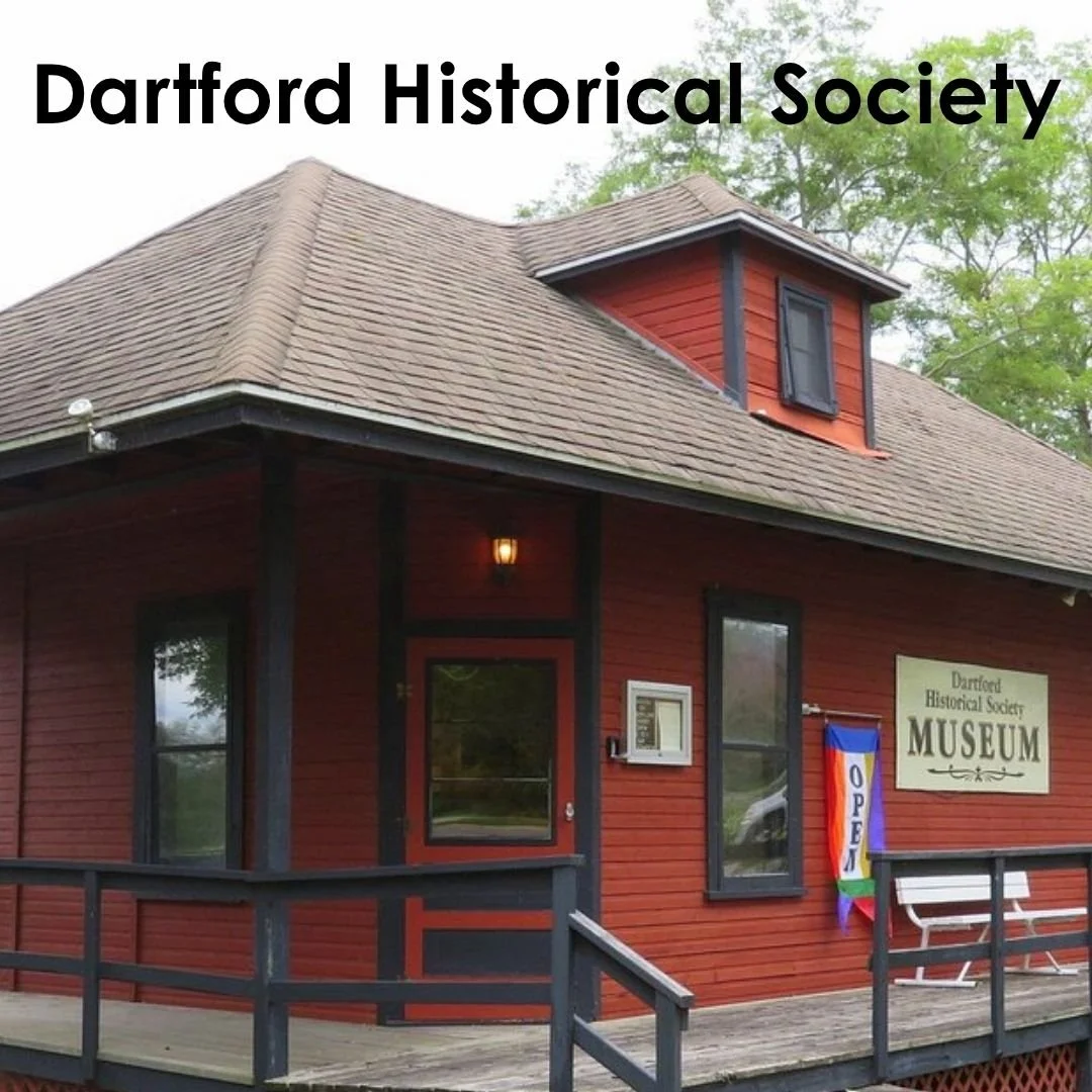 Exterior of the red Dartford Historical Society Museum building in Green Lake, Wisconsin.