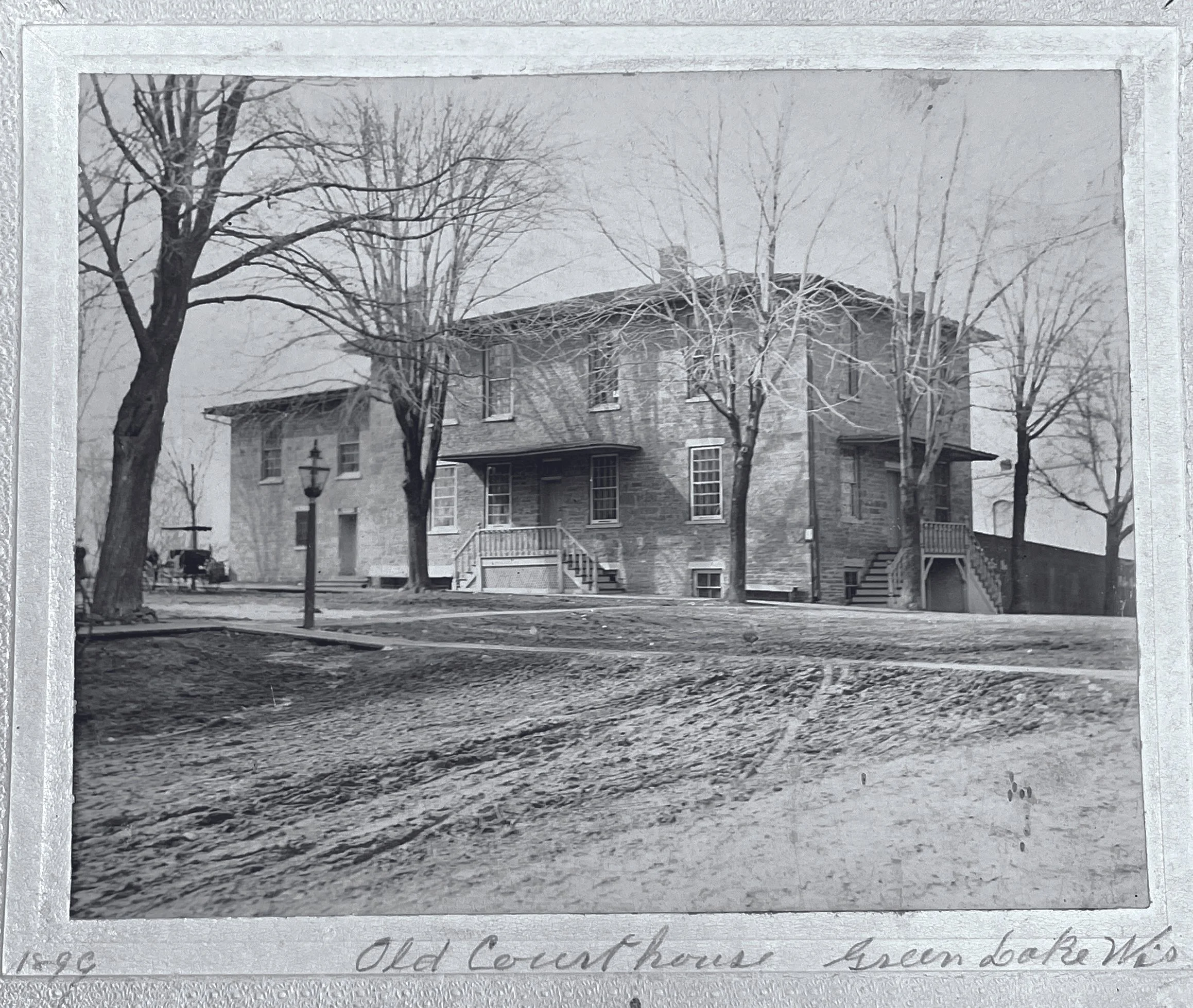 A two-story stone courthouse was built on this site in 1863, serving Green Lake County for more than three decades before the present courthouse was constructed.