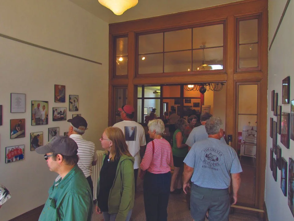 Town Square Community Center officially opened on August 11, 2012, with a mission to meet the needs of the Green Lake area while preserving the historic courthouse buildings.