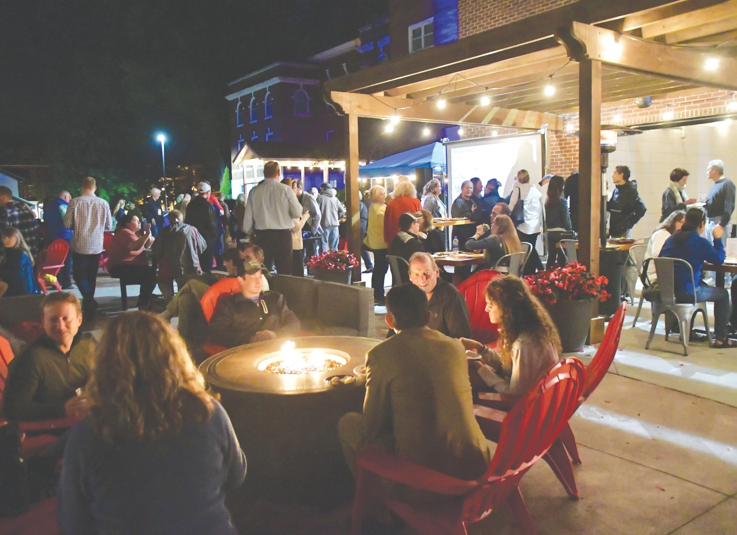 Former parking lots behind Town Square were transformed into Mill Pond Terrace, creating a new outdoor gathering and event space overlooking the Mill Pond.