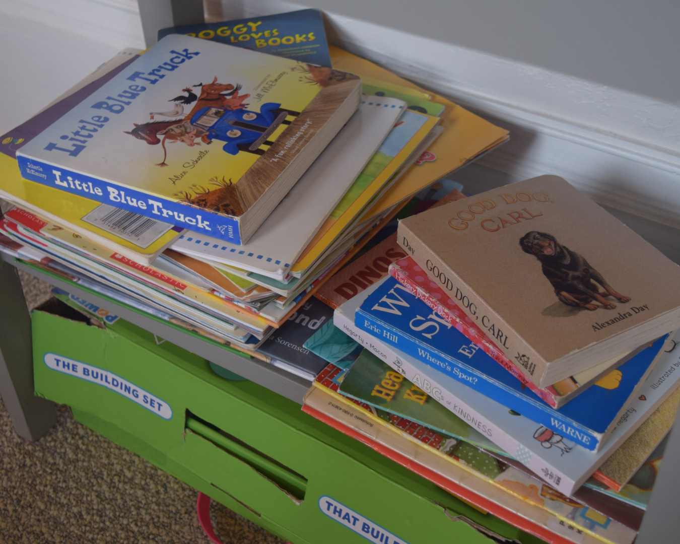 Child enjoying the reading area in The Hub, a free indoor play space for kids in Green Lake, Wisconsin.