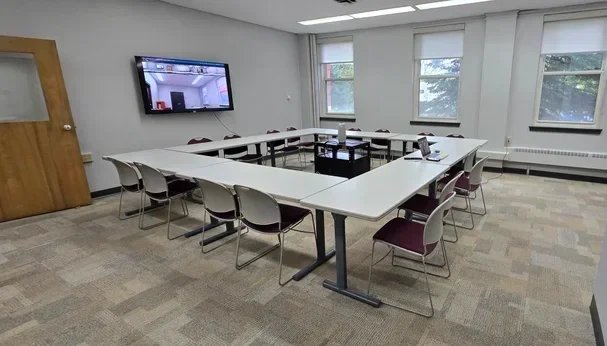 Studio B at Town Square Community Center set up with tables and chairs for meetings and small group gatherings.
