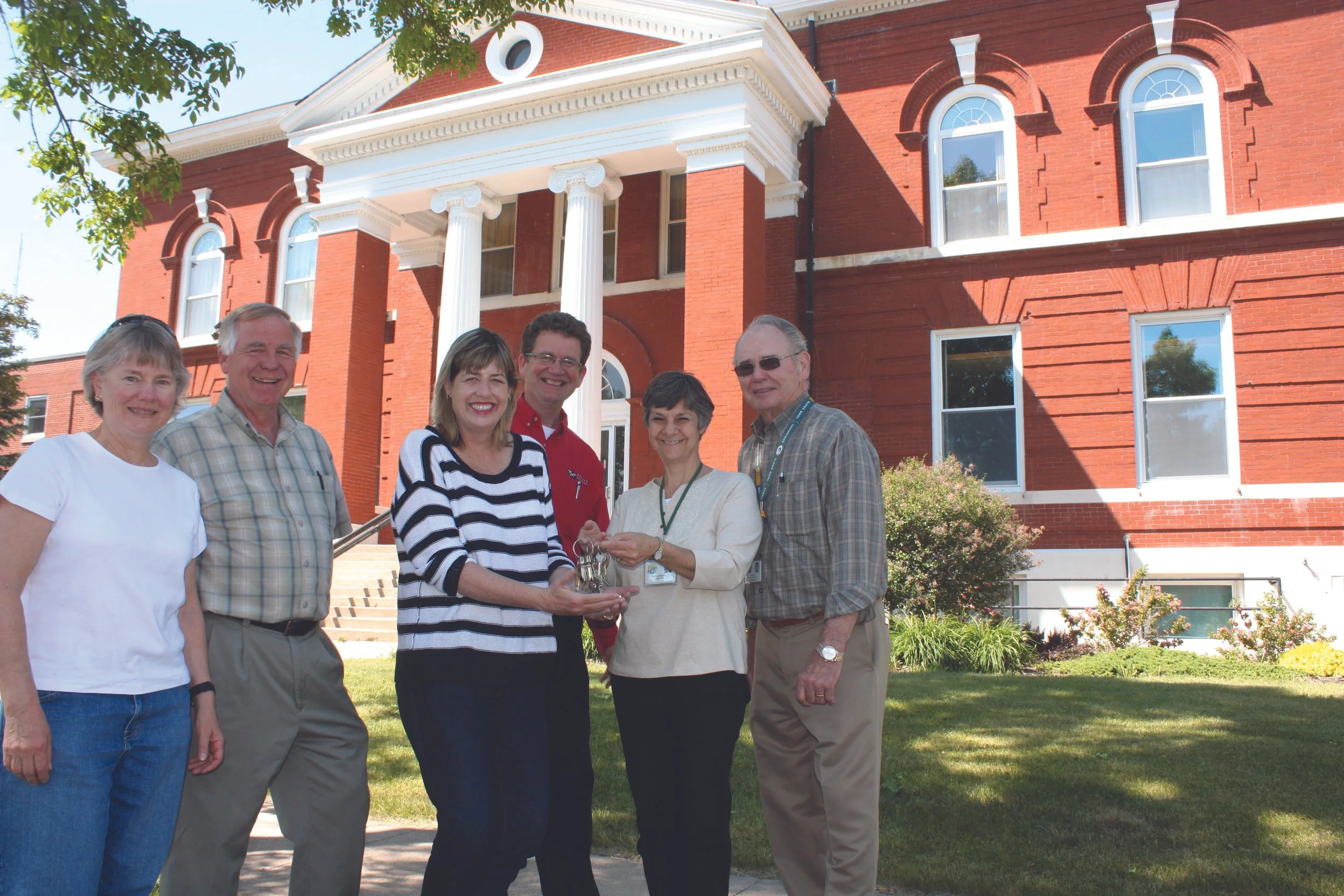 After Green Lake County moved to a new facility, the historic property was sold to the Cornerstone Project for $1. The County Clerk handed over the keys on May 12, 2012, beginning the building’s next chapter.