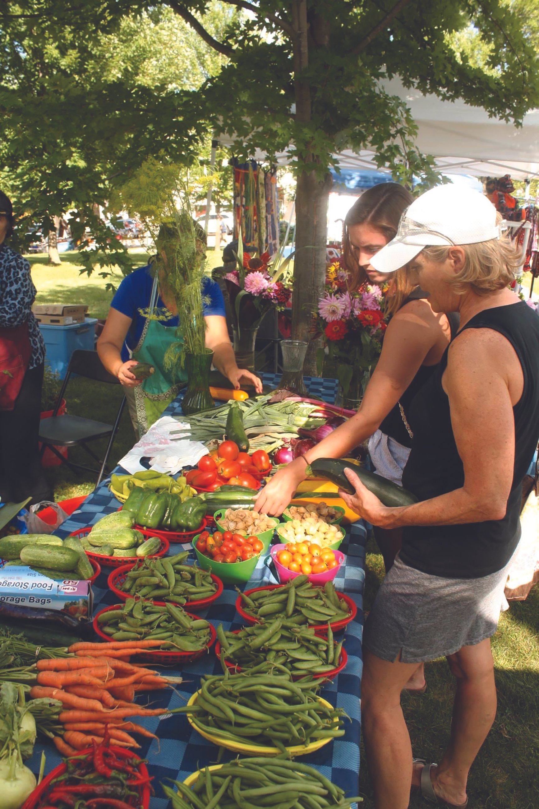 Town Square took over management of the Green Lake farmers market and moved it to the Town Square lawn, bringing vendors and shoppers together downtown.