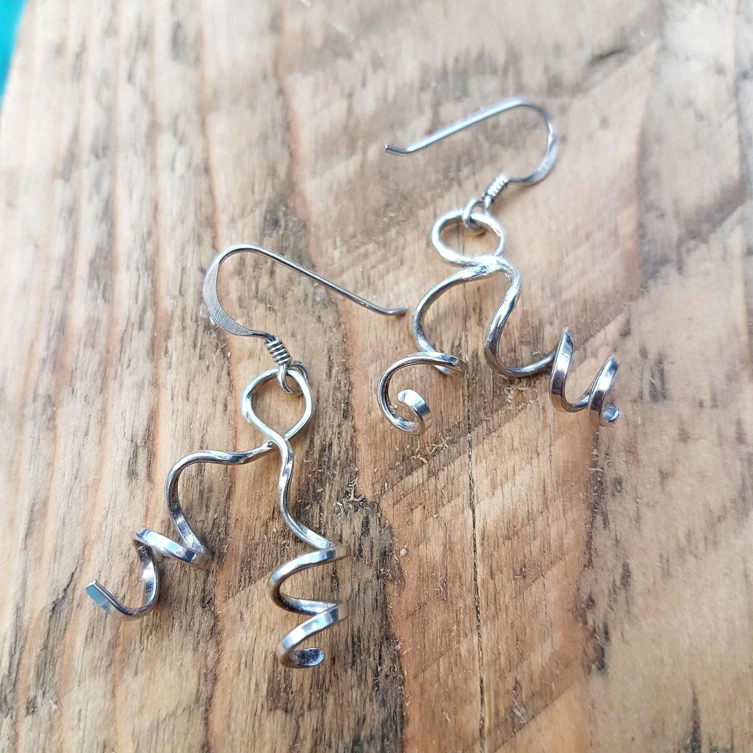 Handmade silver crazy coil earrings