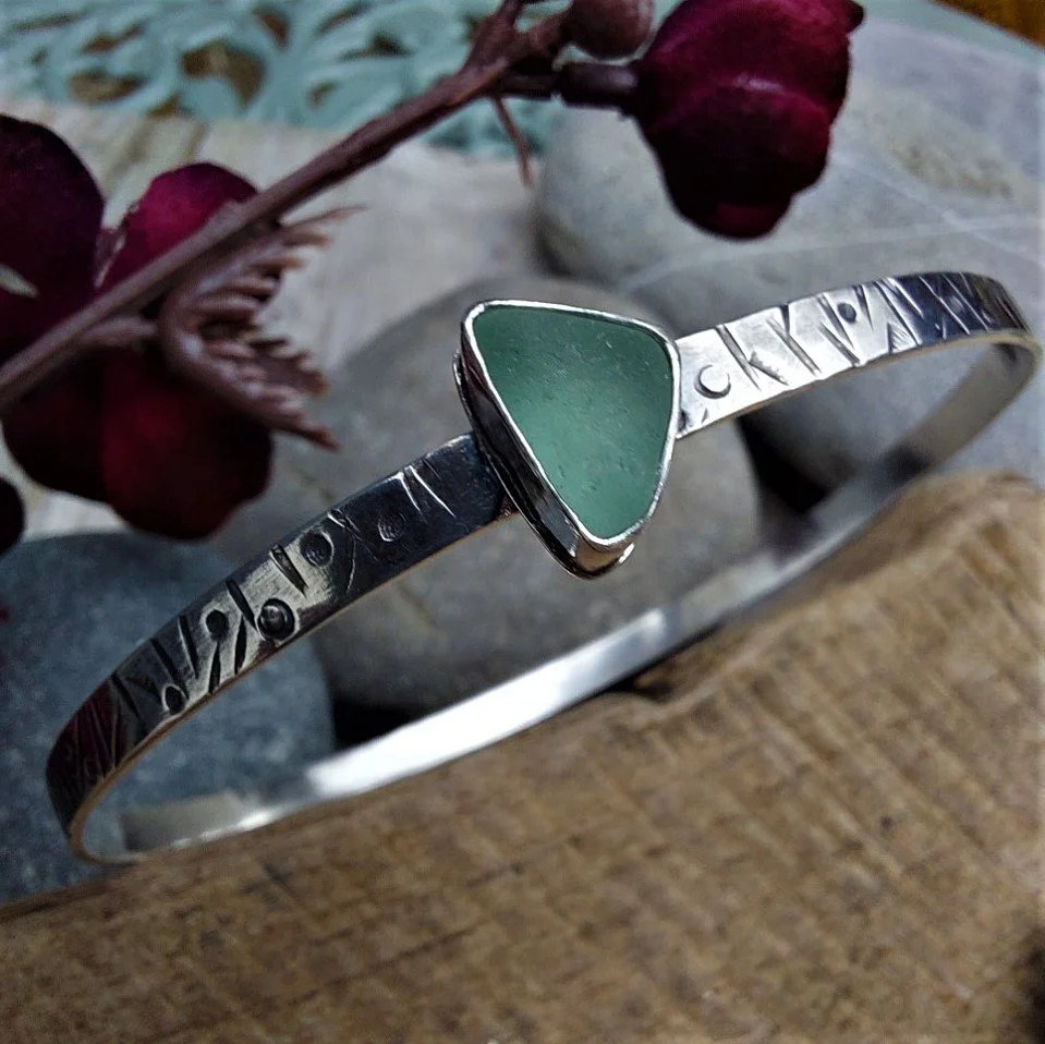 Silver hand stamped aqua sea glass bangle