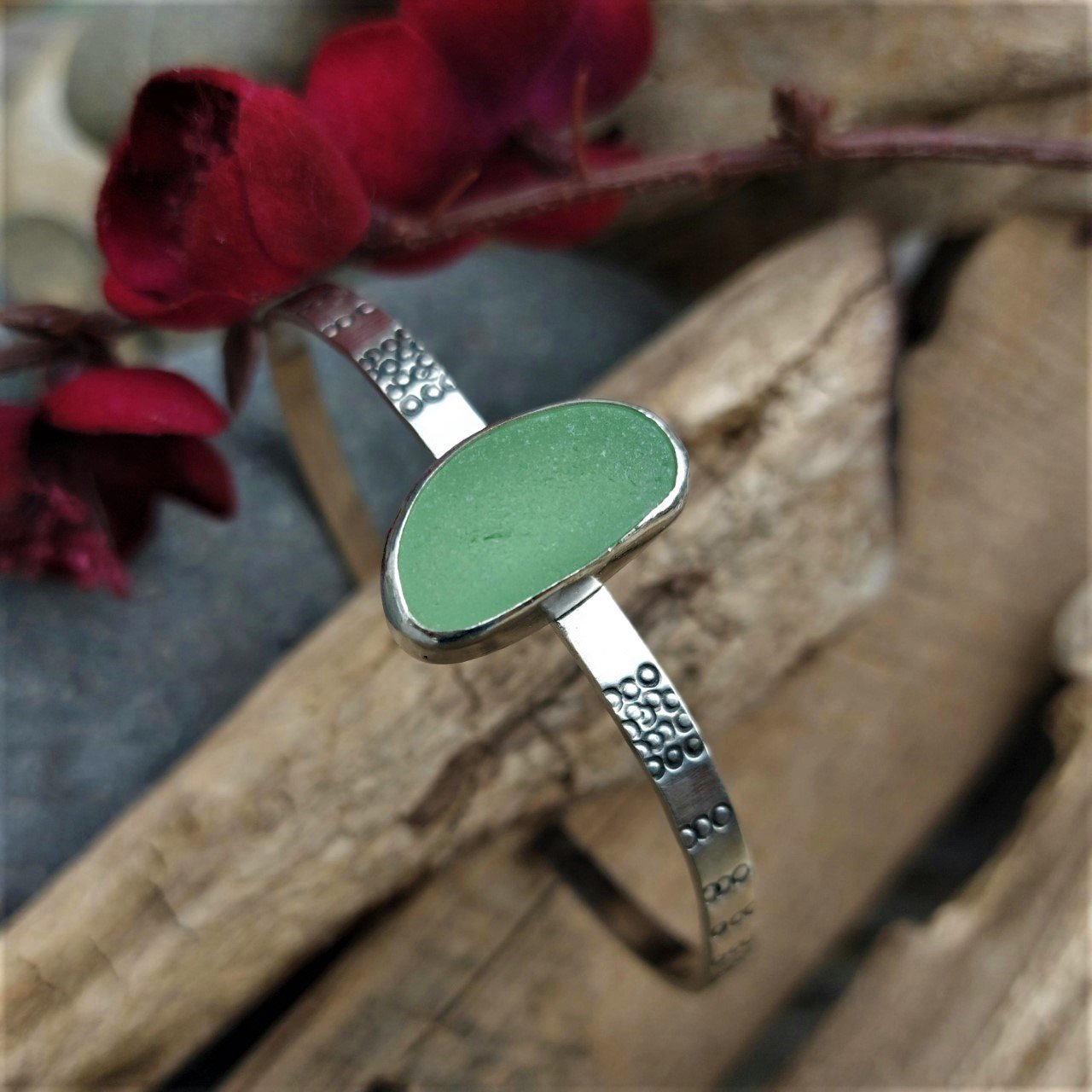 Hand stamped green sea glass cuff