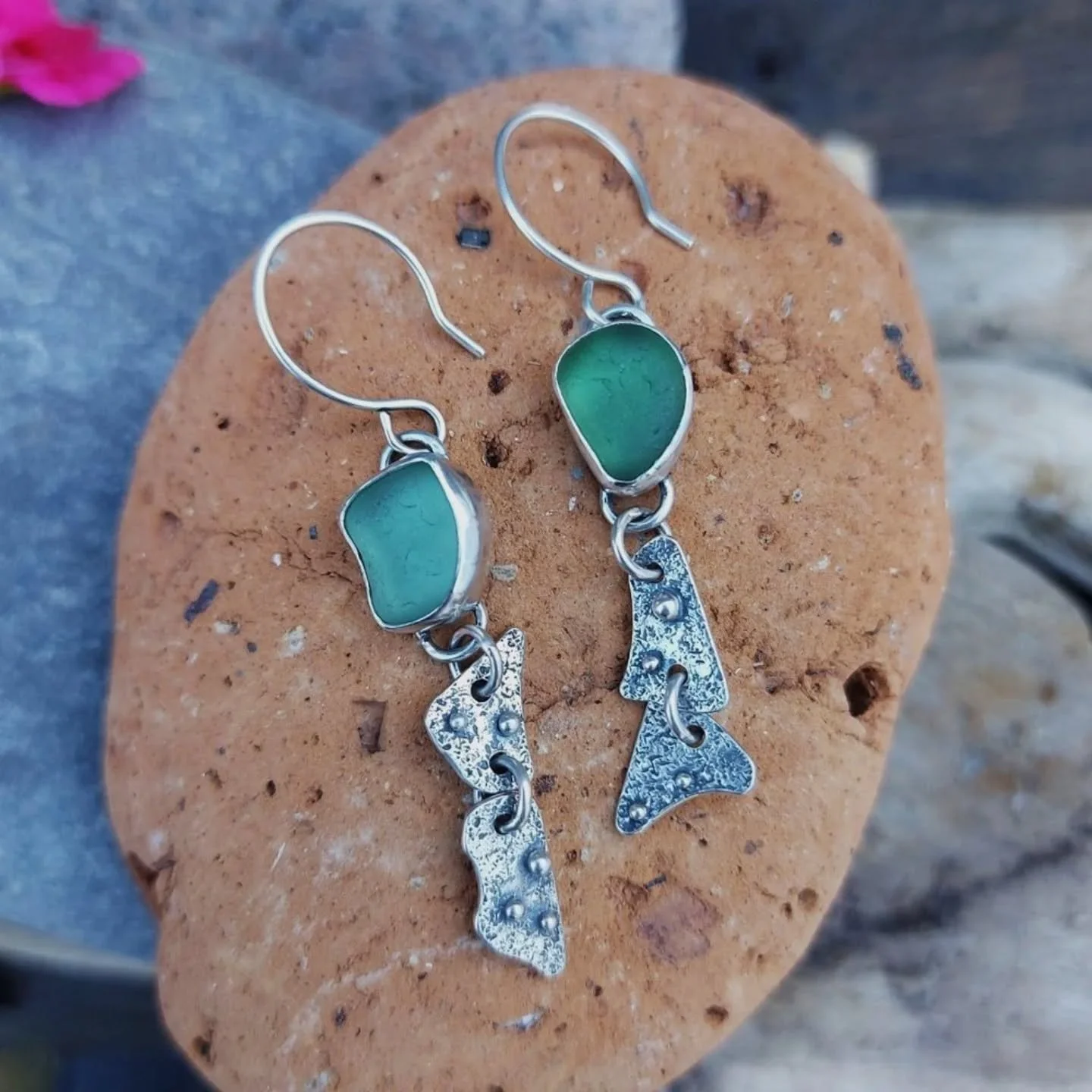 Have you ever found sea glass? It is simply broken glass found on the beach. Instead of being jagged and sharp, it has been in the ocean for some time before it washes ashore and has become frosty and smooth from hitting rocks, swirling in sand and b