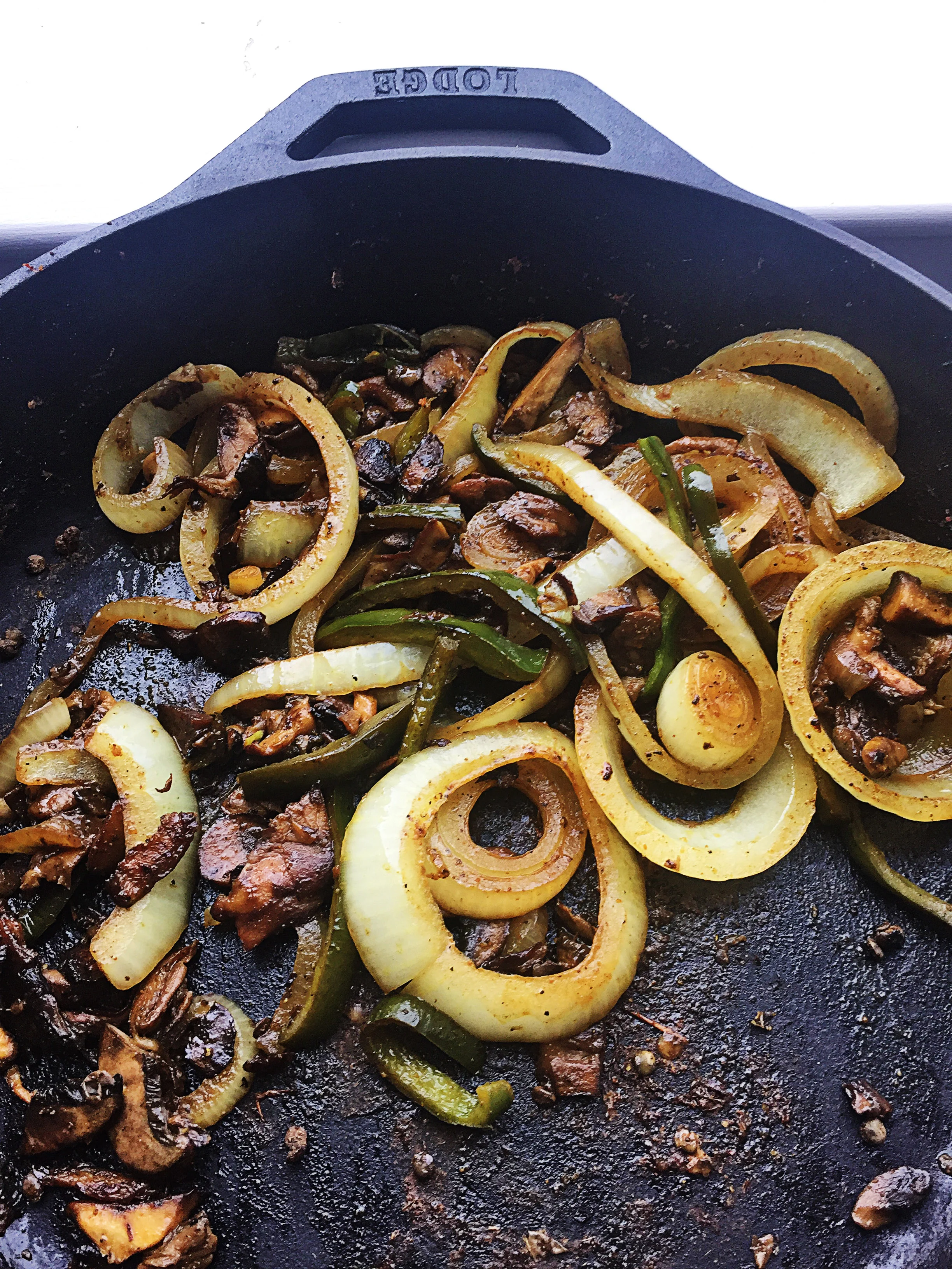 6. After 20 minutes, your caramelized onions and vegetables should be done. At this point, dumb out your caramelized goods and put 1-2 tbl of olive oil in pan. Place pan over medium heat for a couple minutes. Place in patties. Cook for 5 minutes on each side until brown sear forms on each patty. 