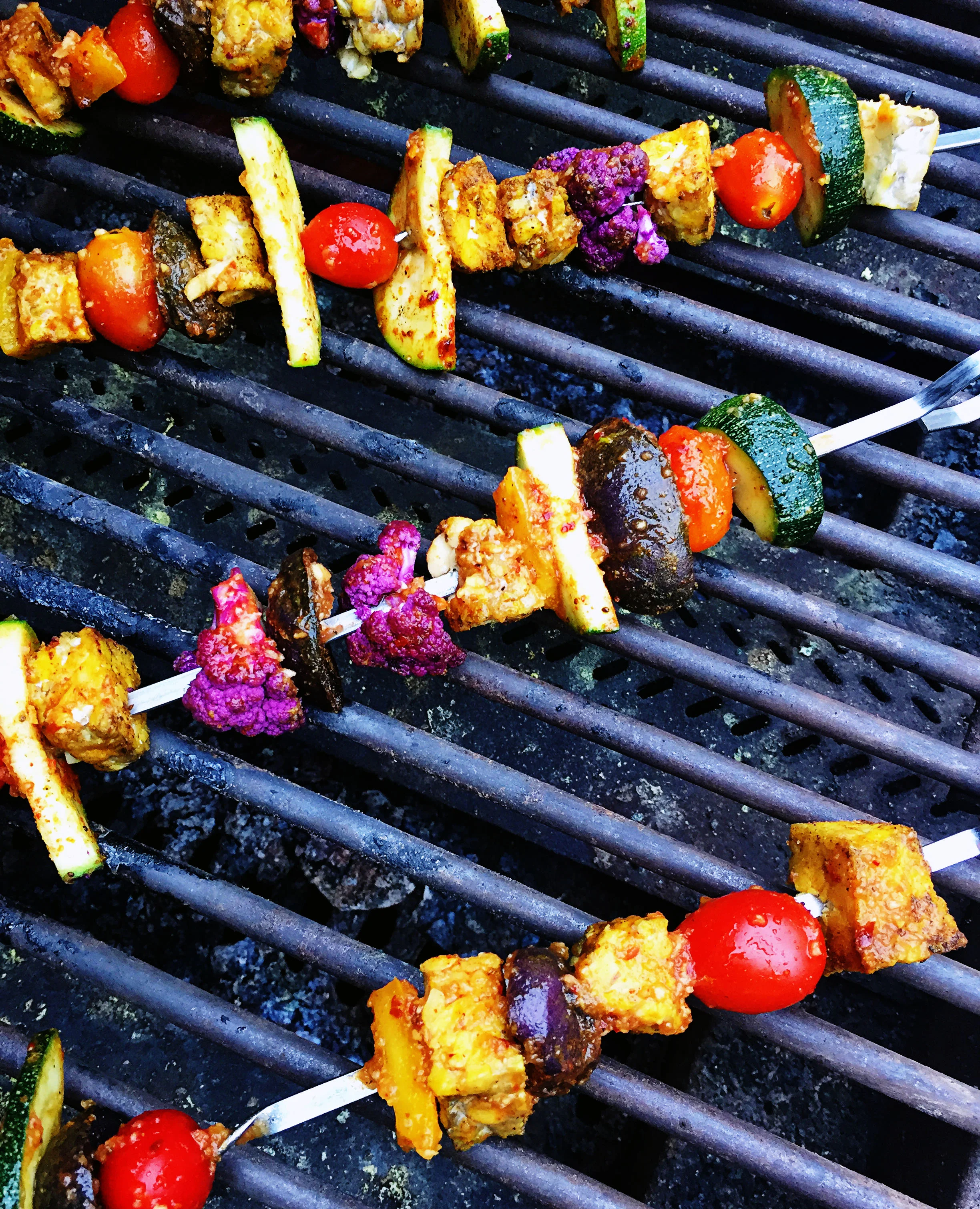 7. Place BBQ drenched kebabs on the grill. We want the grill pretty hot nearing 400F to get a nice sear and grill on the veggies. Keep the veggies on each side for 3-4 minutes until they start to get a nice char. I leave the grill open since I'm going to add more BBQ and want to watch closely.