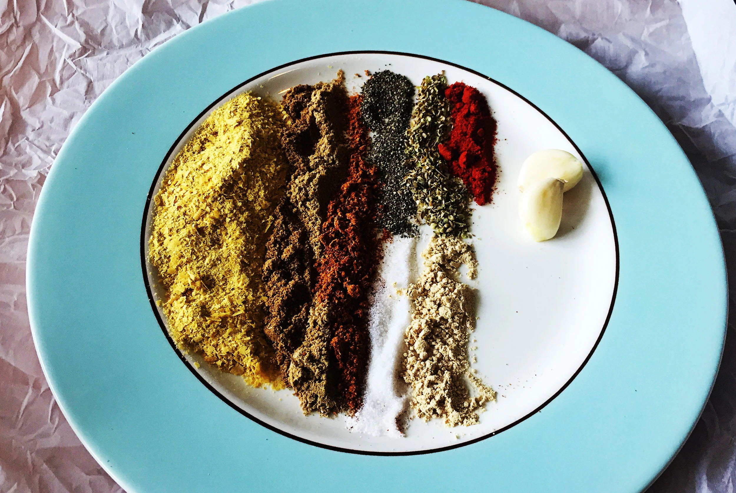 3. Next place all spices for the taco meat into pan and cook for 30 seconds. finally add lentils, salsa, and nutritional yeast.