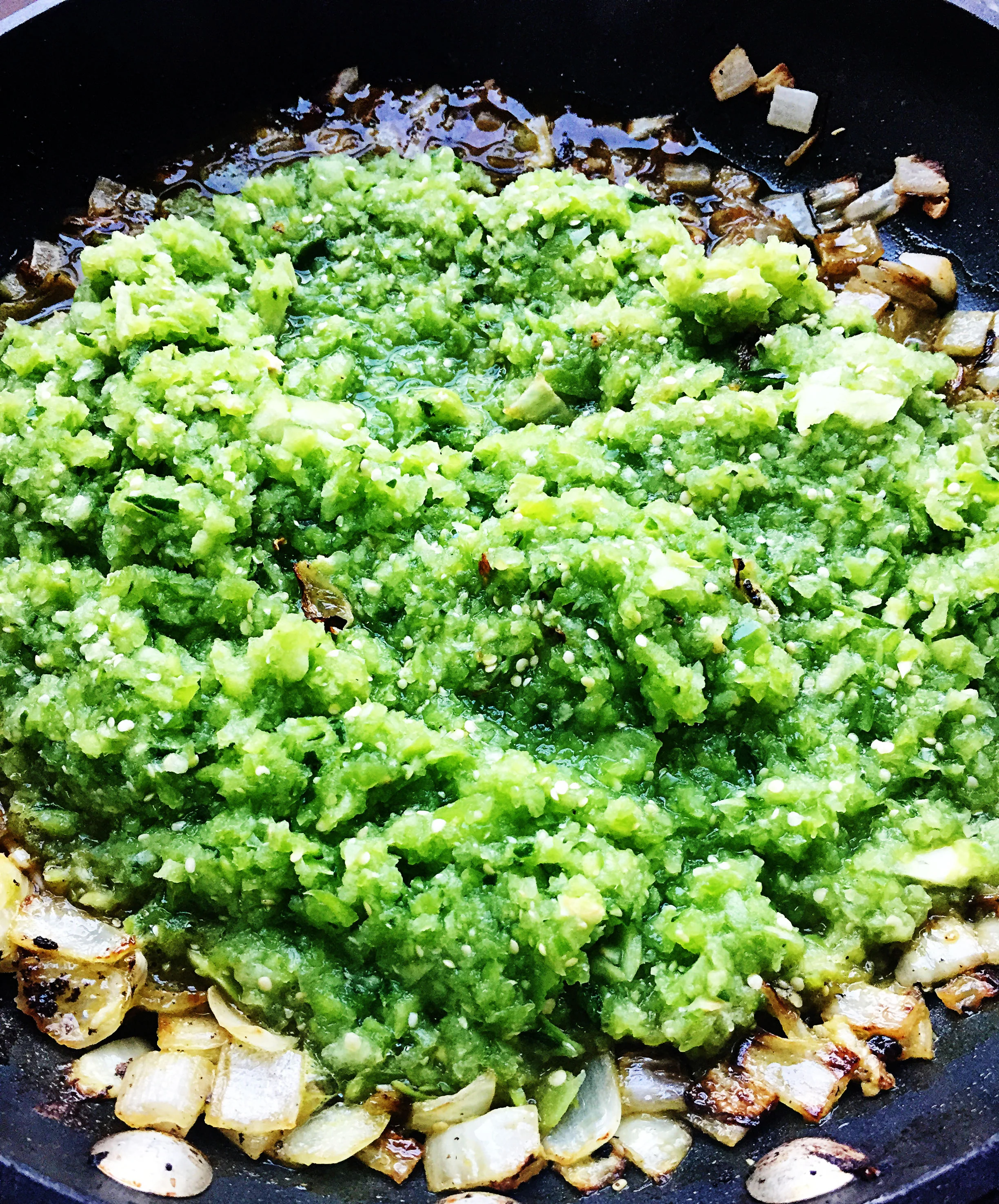 7. Add salsa to pan with onions in it and saute over medium low heat until ready to bake enchiladas.