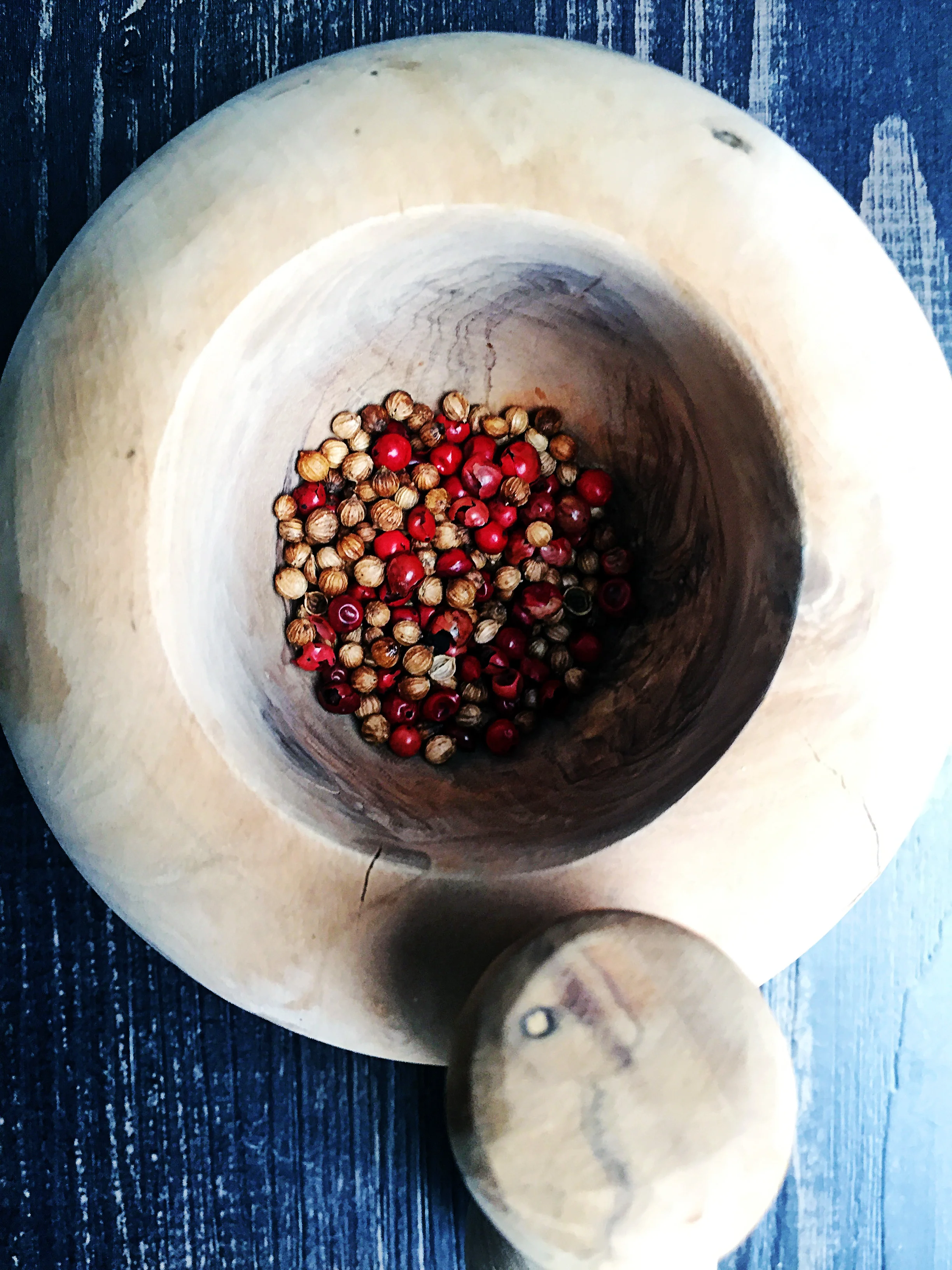 3. Take the toasted spices and place into mortar and pestle to grind it. If you do not have one, you can use a blender or food processor to break them down. You want to create a fine texture. 