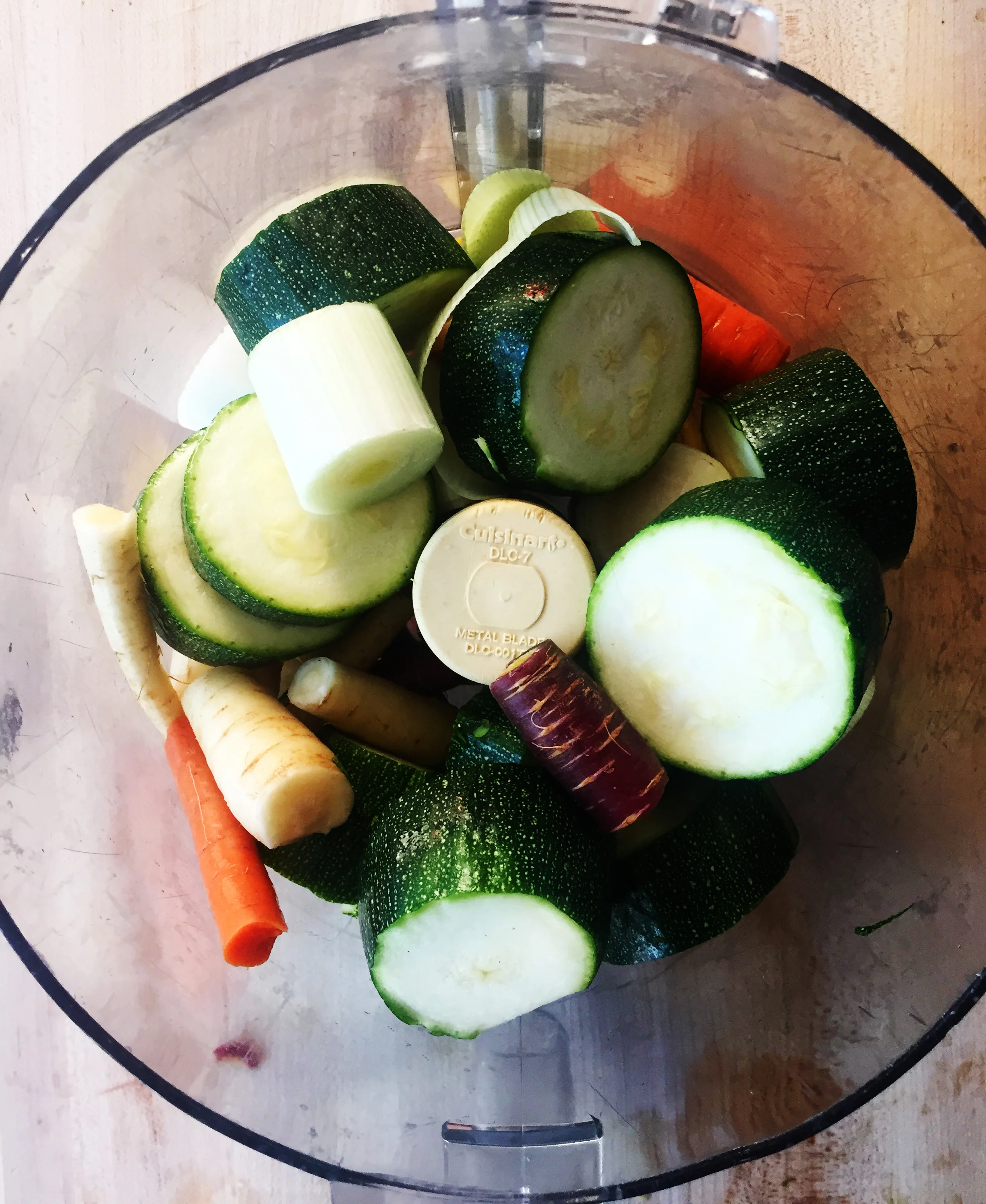 1. Place 1/2 your chopped ingredients in a food processor. Pulse the processor until you have a decent breakdown of the vegetables. Remove, set aside, pulse second 1/2.