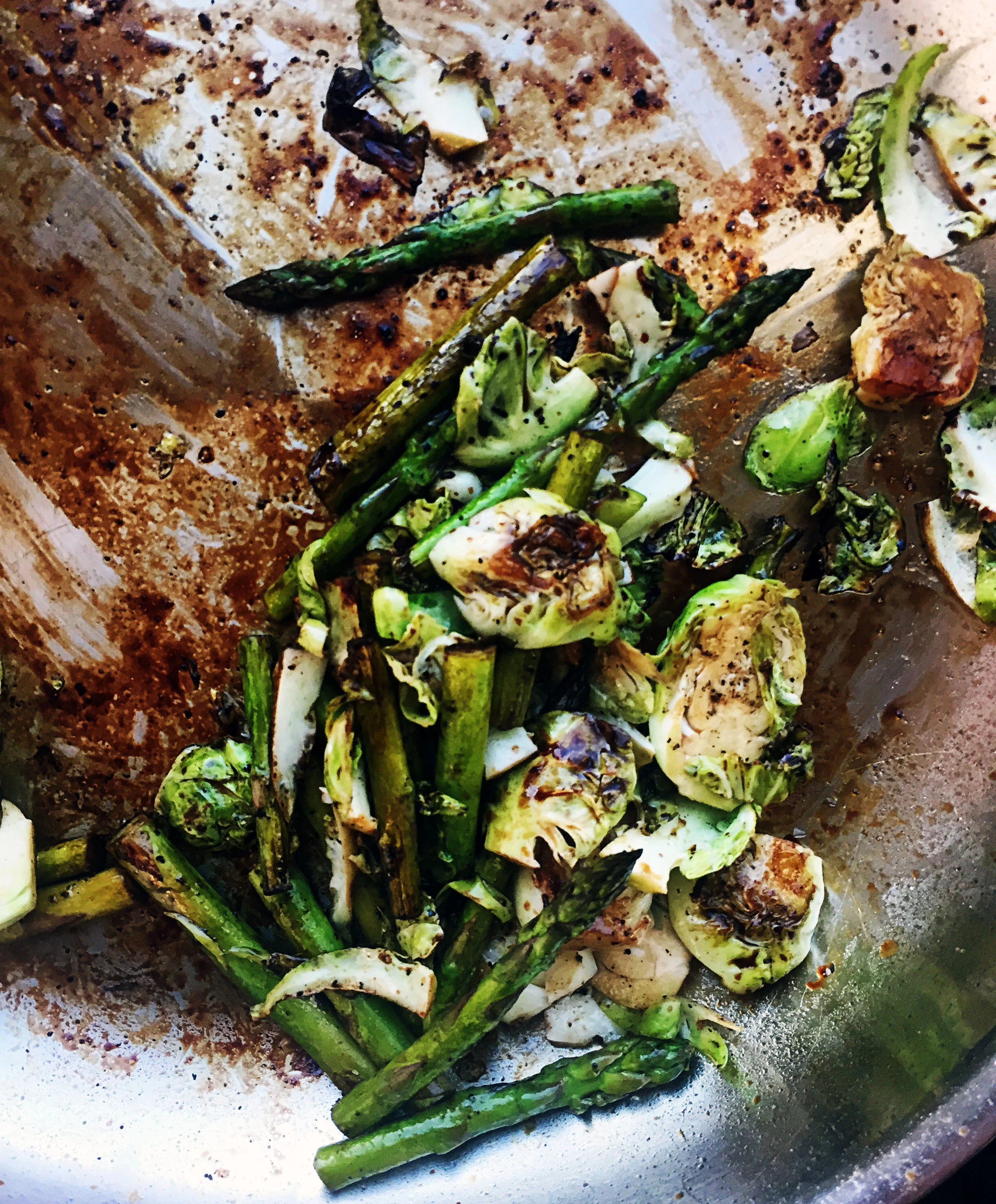 7. Finally, add the asparagus and brussel sprouts plus oil to a large pan. Cook on medium-high heat for five minutes before adding balsamic vinegar and cook for another five minutes.