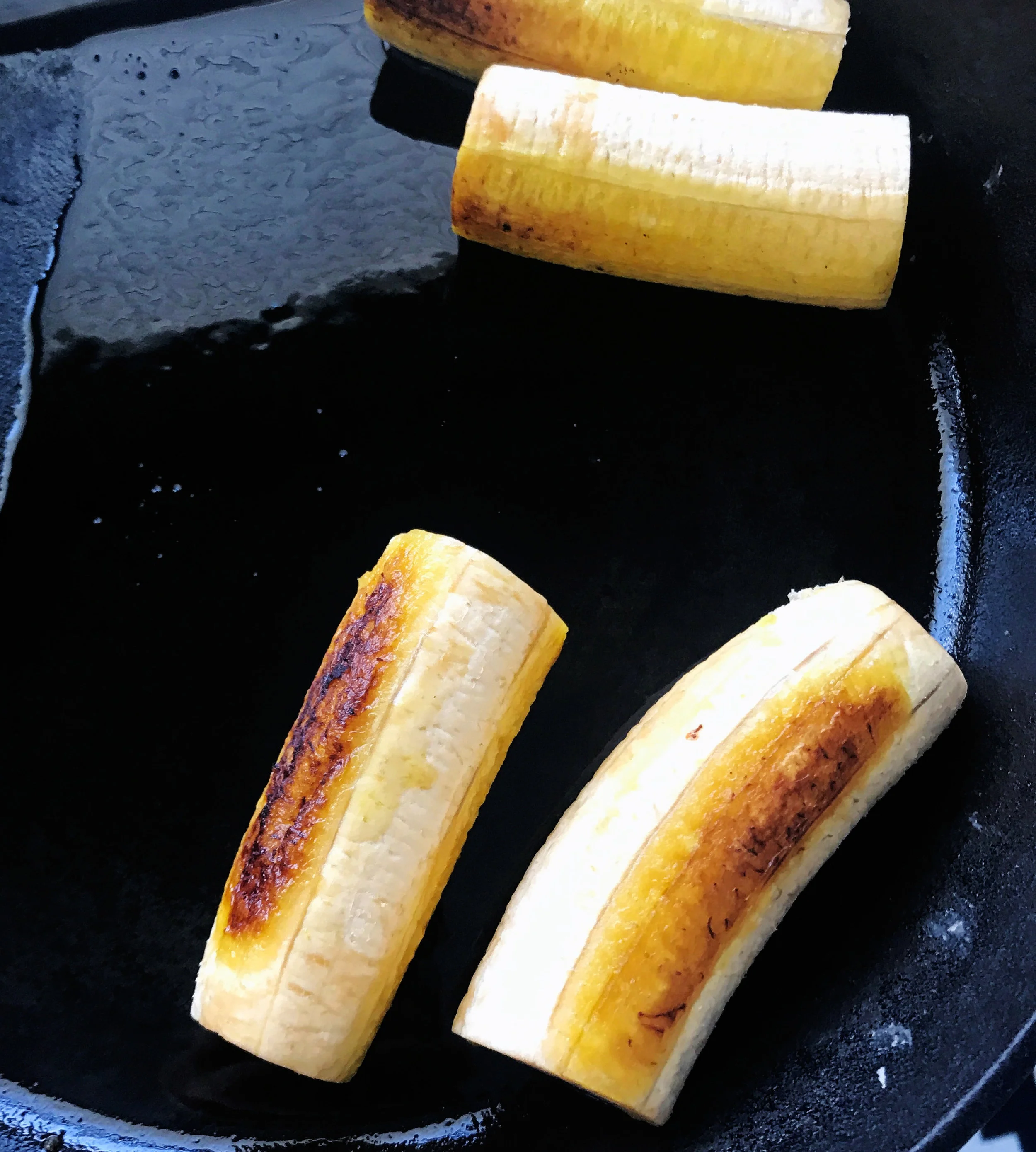 5. I started my plantains next. Put 1 tbl of olive oil in castiron pan and char plantains on each side for about 3 minutes. 