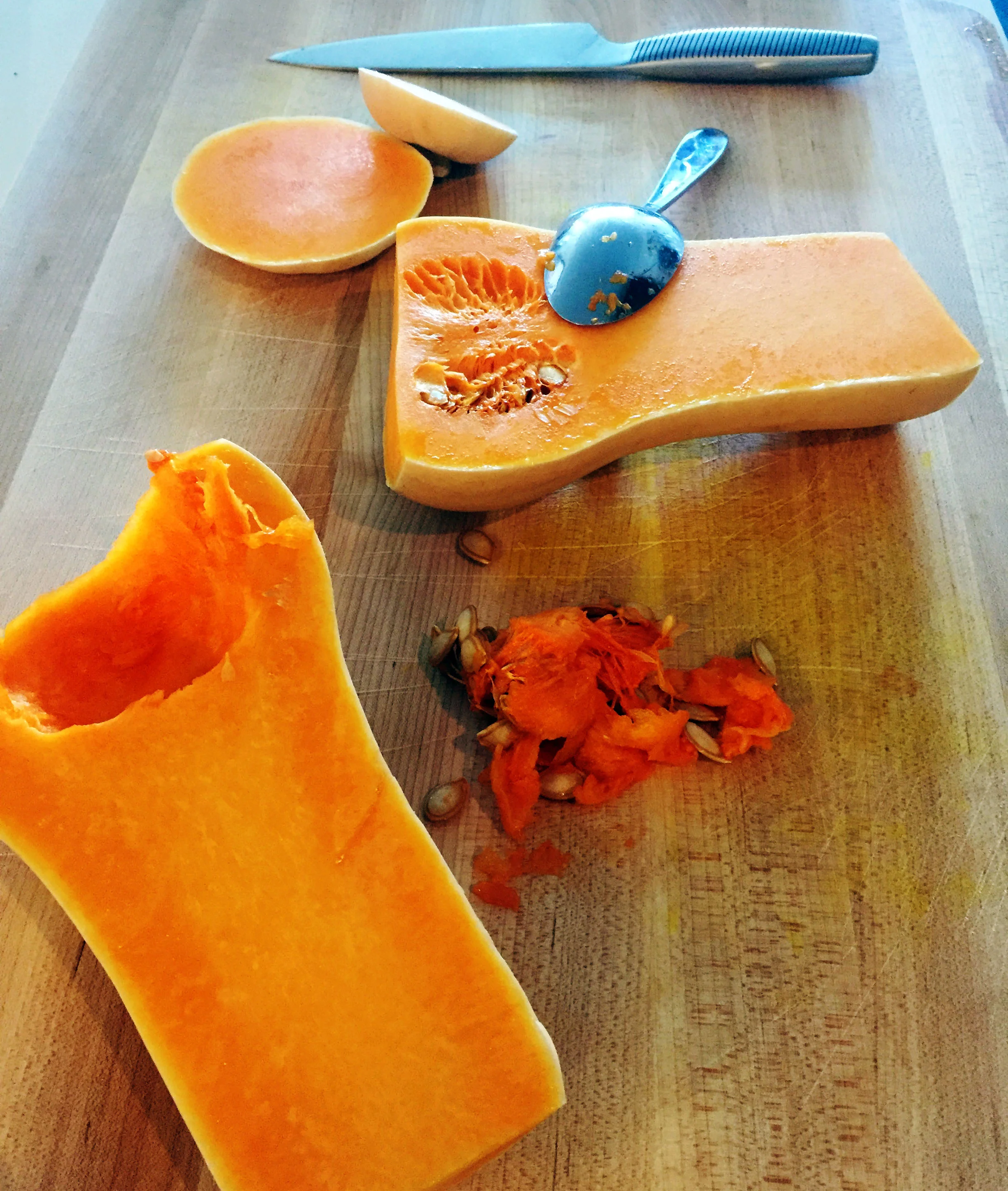 1. Cut your squash in half. Scoop out the seeds. Rub 1 tsp of oil on the squash and salt/pepper lightly. Place cut side down on parchment lined baking pan, slide into oven and back 40-45 minutes. Let cool for few minutes.