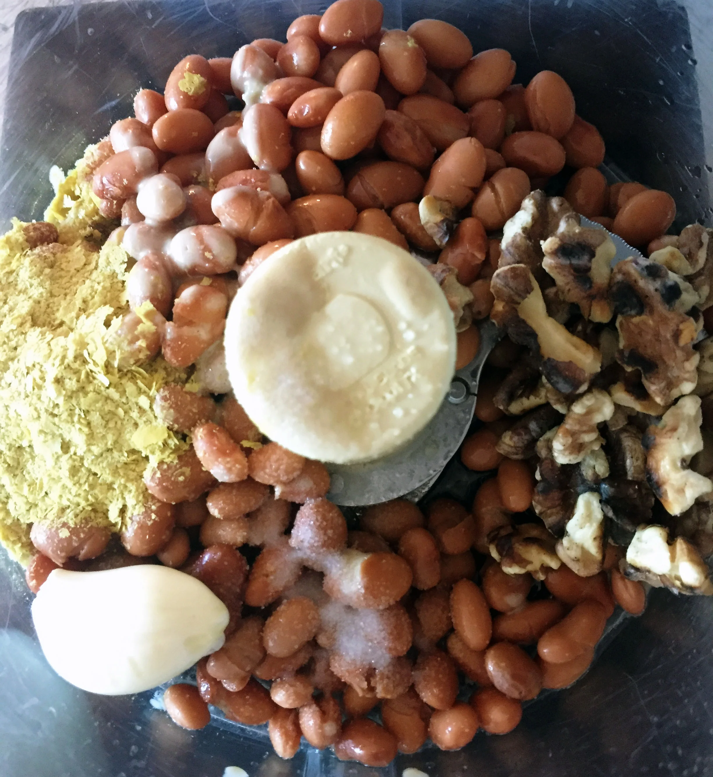 3. Clean out your processor and now add all the hummus ingredients.