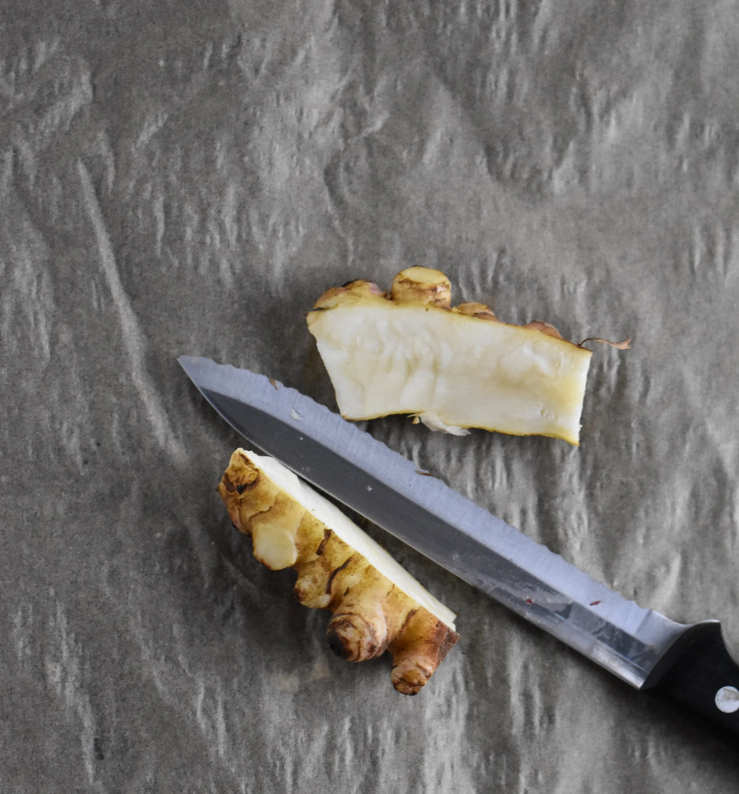 1. To dice the sunchokes, cut them just like potatoes. I like to slice them down the middle and then cut small cubes/squares from there.
