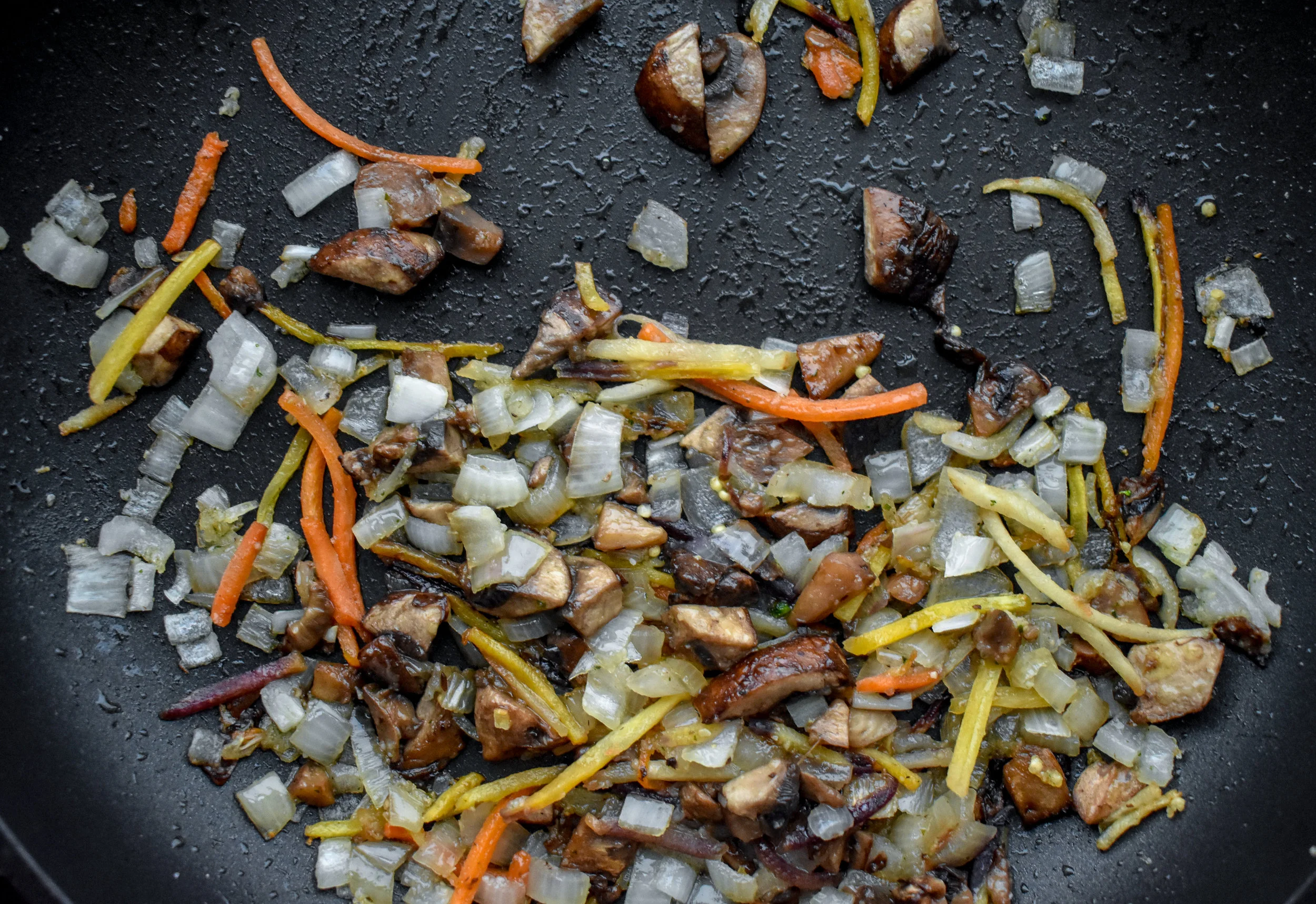 1. While the millet cooks, place mushrooms carrots, garlic and shallot in medium pan with 1 tbl of olive oil. Cook over medium heat for 5-6 minutes.