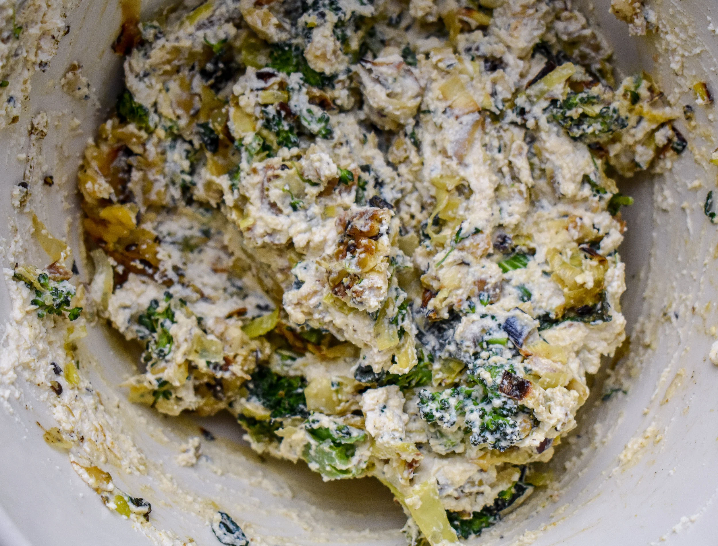 9. Mix the tofu with the veggies. It should be fairly thick like cream cheese nearly.