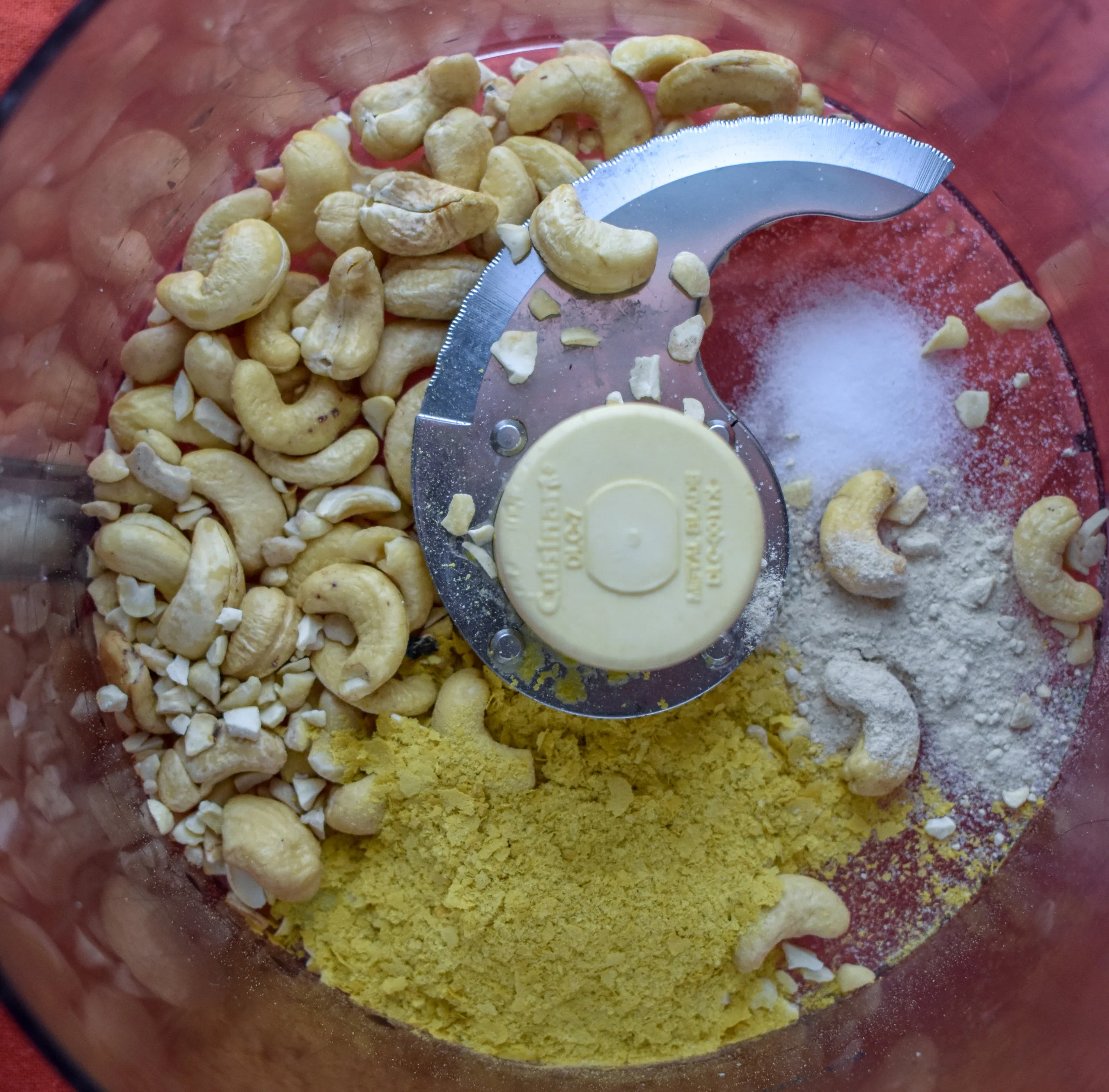 5. Blend all the ingredients for the vegan parm in a food processor until well blended like a grated parmesan.