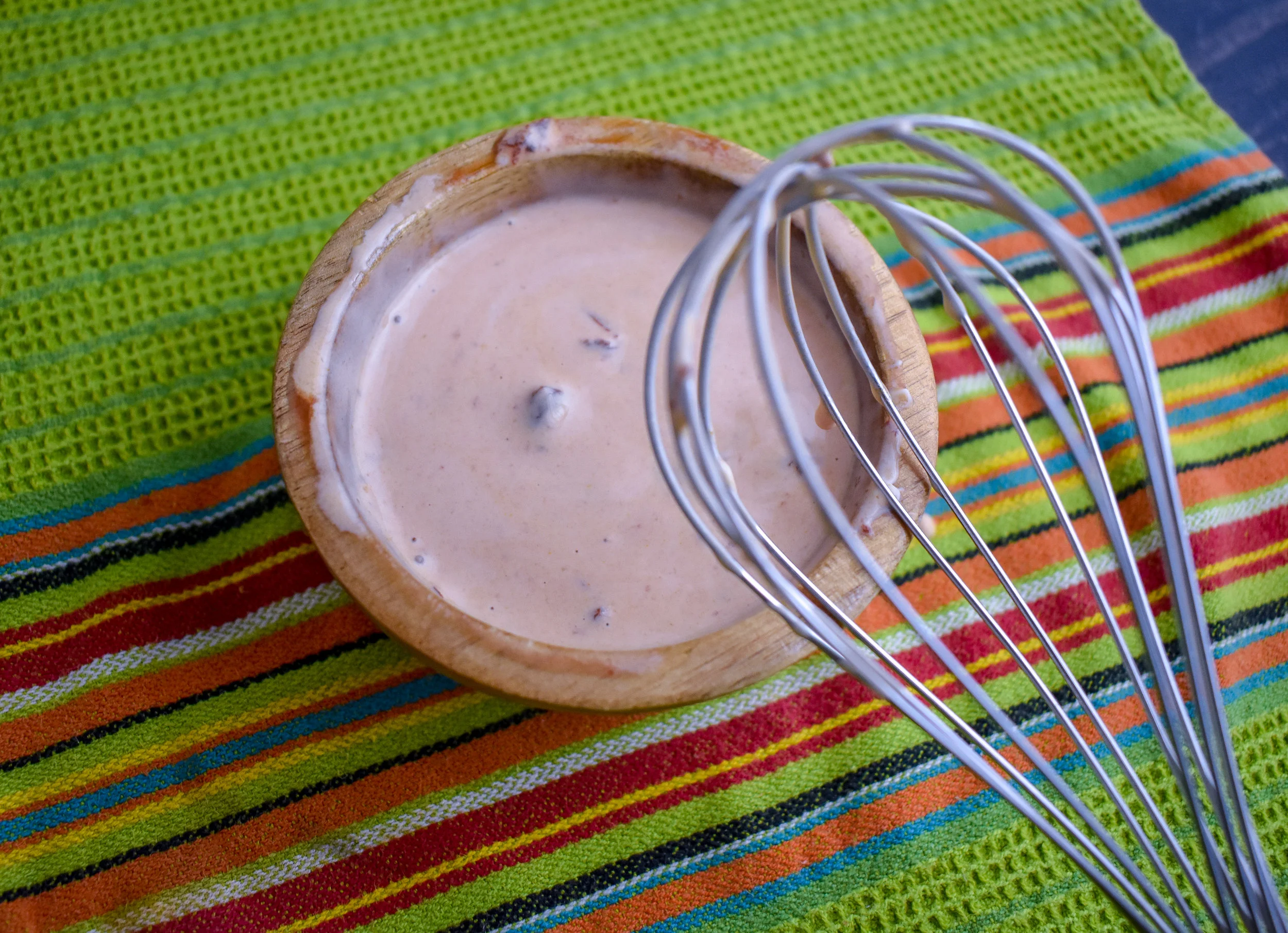 7. While the dogs are steaming, whisk your crema ingredients together in a small bowl. Set aside.